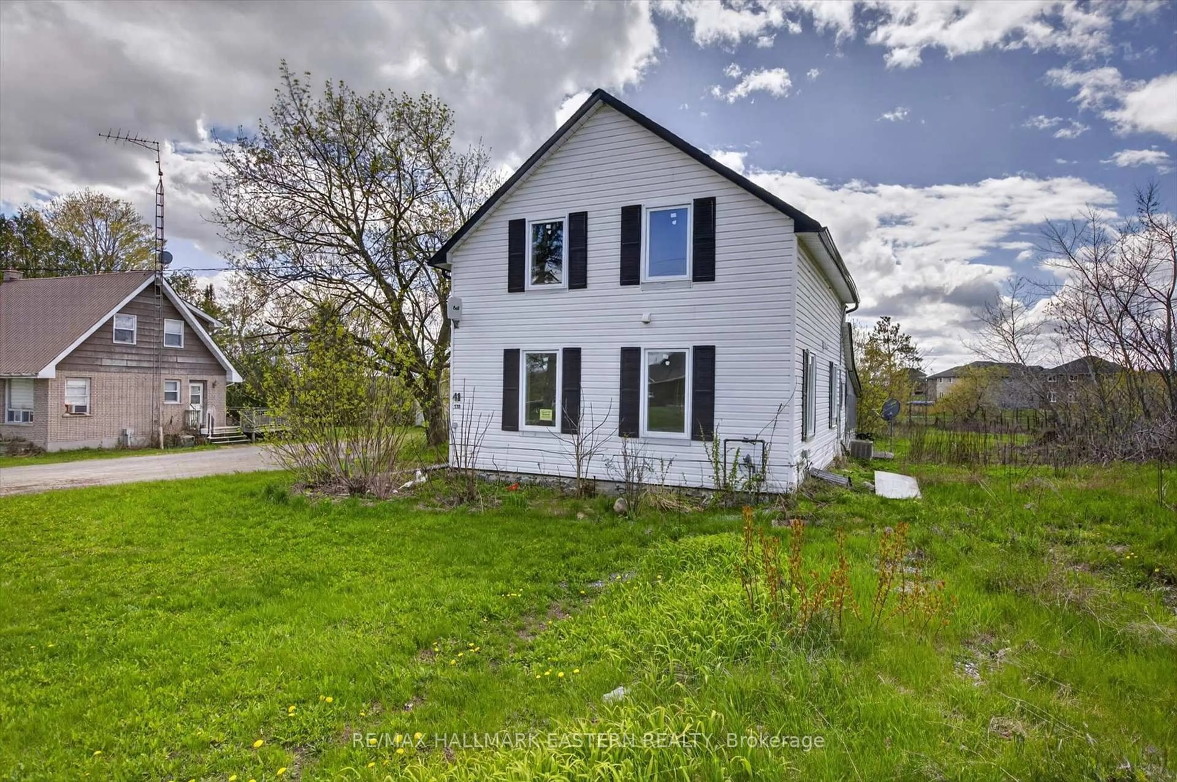 A pic from outside/outdoor area/front of a property/back of a property/a pic from drone, street for 130 County Rd 40, Asphodel-Norwood Ontario K0L 2V0