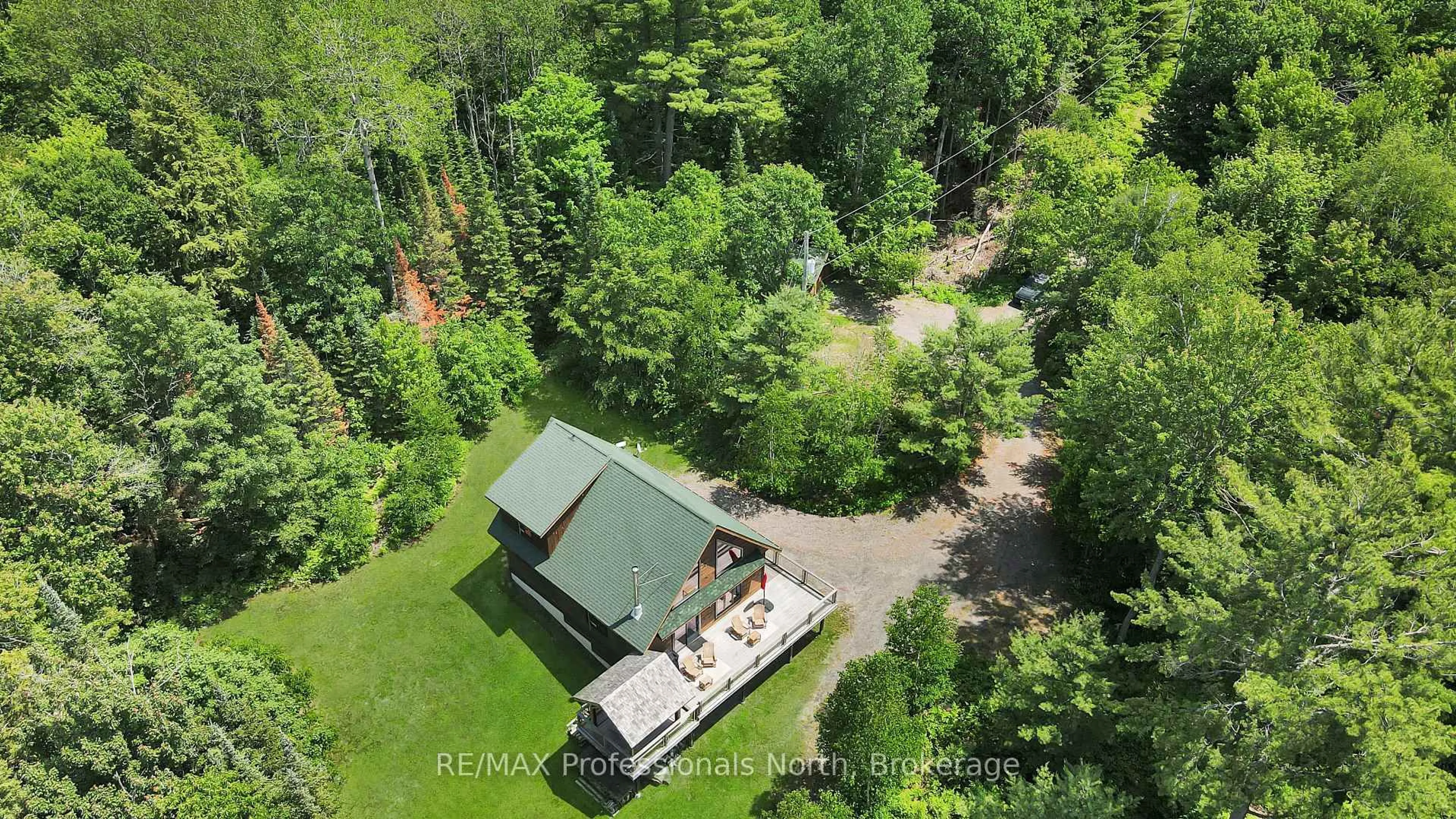 A pic from outside/outdoor area/front of a property/back of a property/a pic from drone, forest/trees view for 3047 Harburn Rd, Dysart et al Ontario K0M 1S0