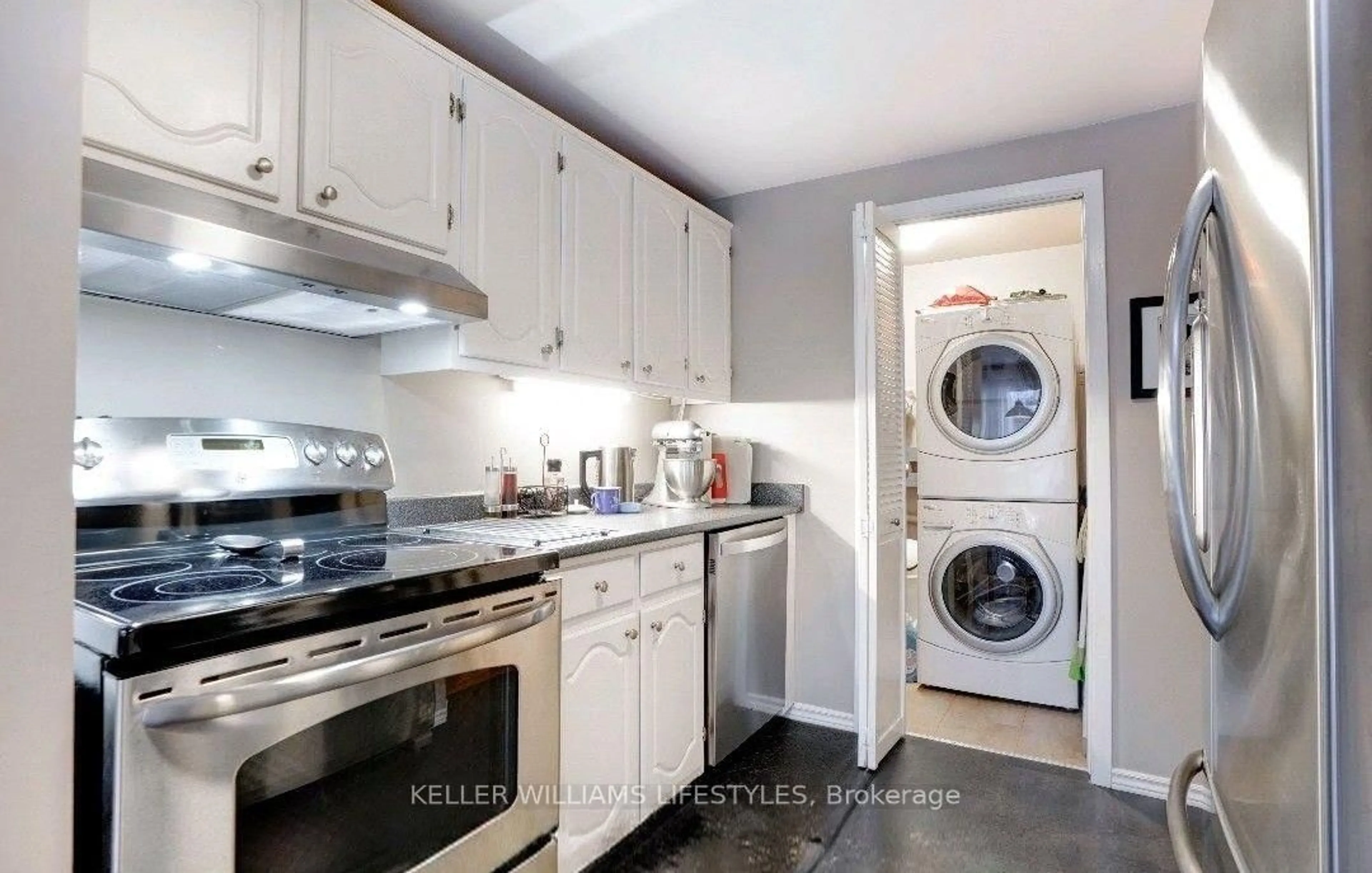 Kitchen with laundary machines, unknown for 70 Chiddington Gate, London South Ontario N6C 4Y3