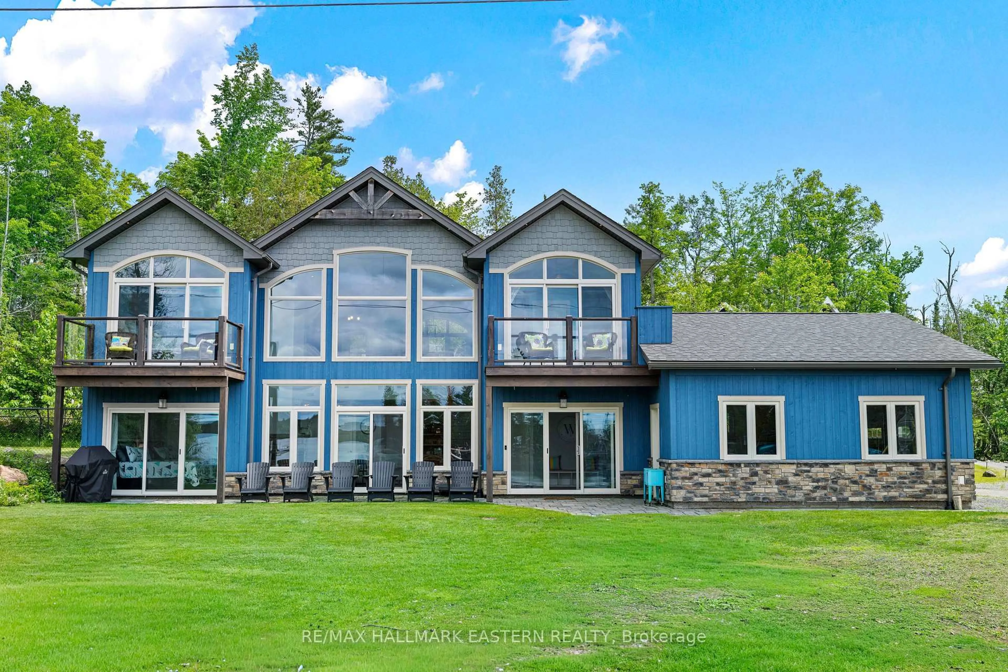 A pic from outside/outdoor area/front of a property/back of a property/a pic from drone, water/lake/river/ocean view for 662 Fire Route 42, North Kawartha Ontario K0L 2H0