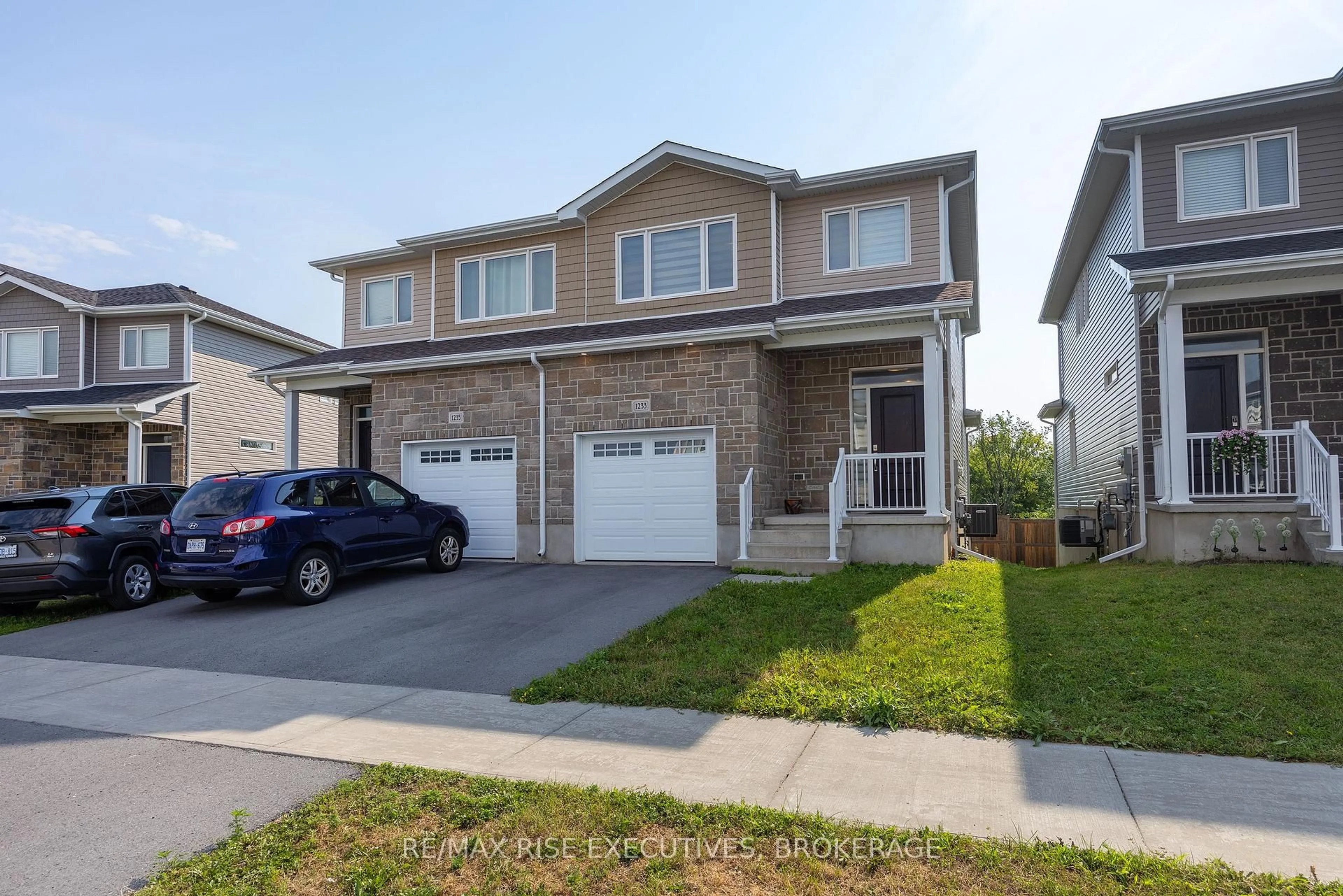 Home with vinyl exterior material, street for 1233 Max Cres, Kingston Ontario K7P 0P3