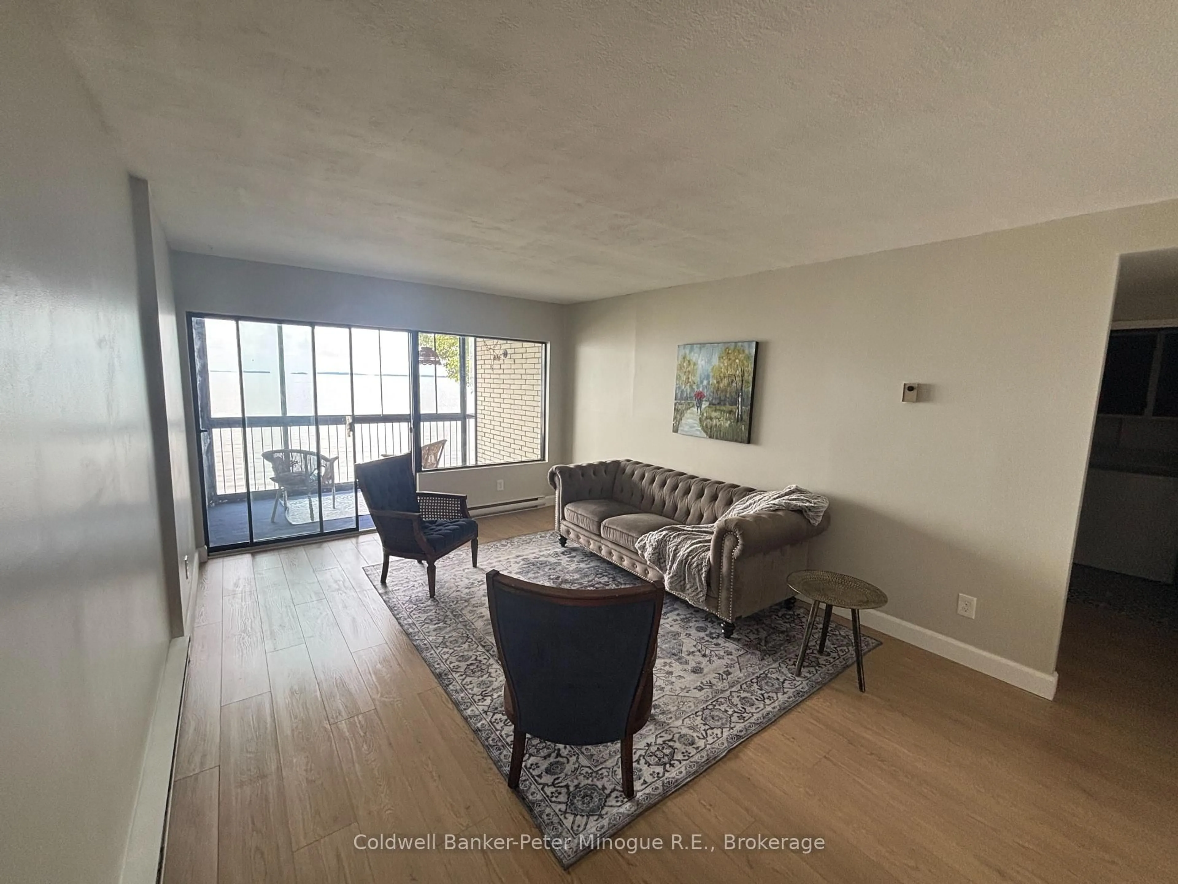 Living room with furniture, unknown for 425 William St #103, North Bay Ontario P1A 1X6