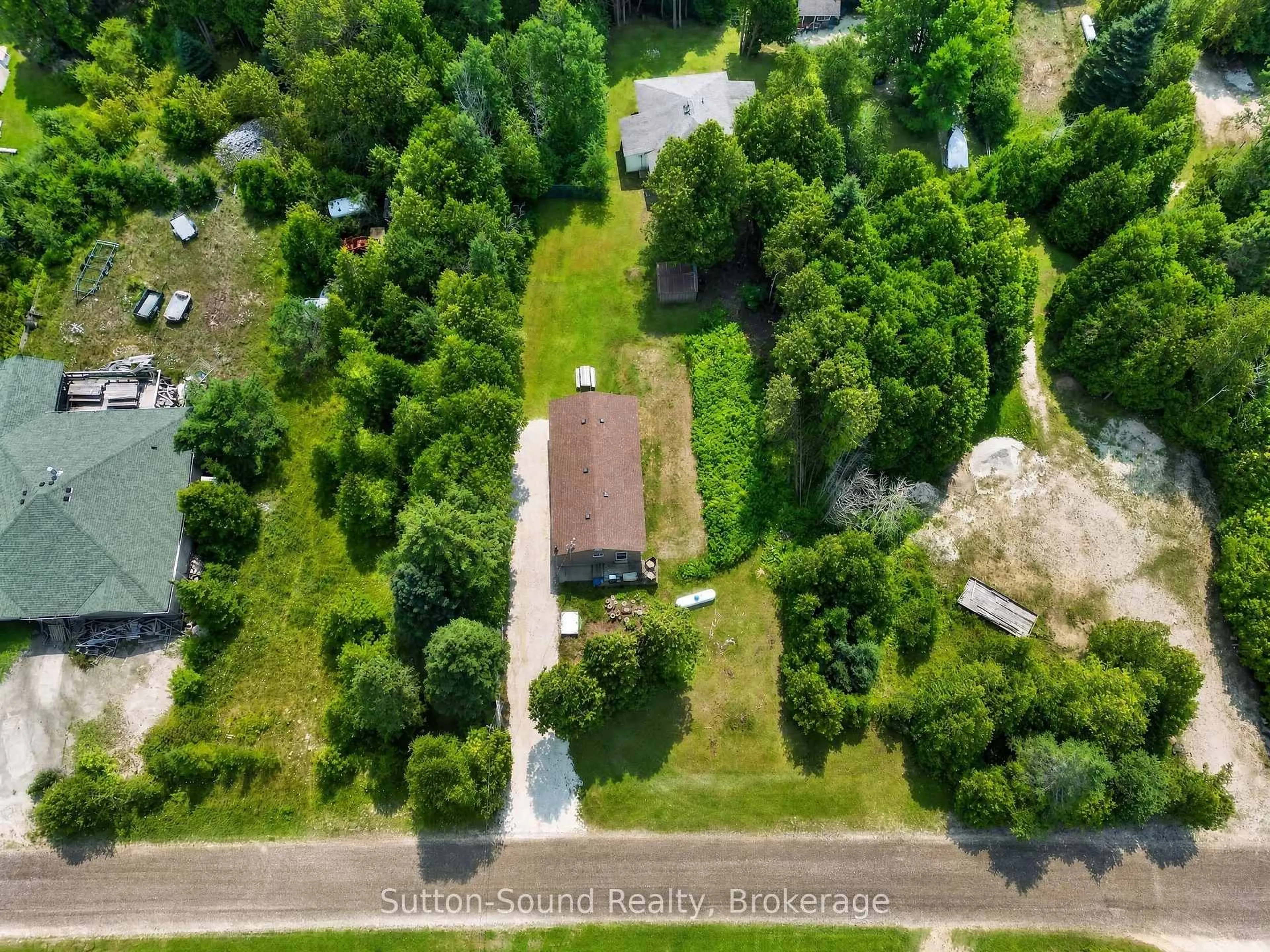 A pic from outside/outdoor area/front of a property/back of a property/a pic from drone, unknown for 24 Isabella St, South Bruce Peninsula Ontario N0H 2T0