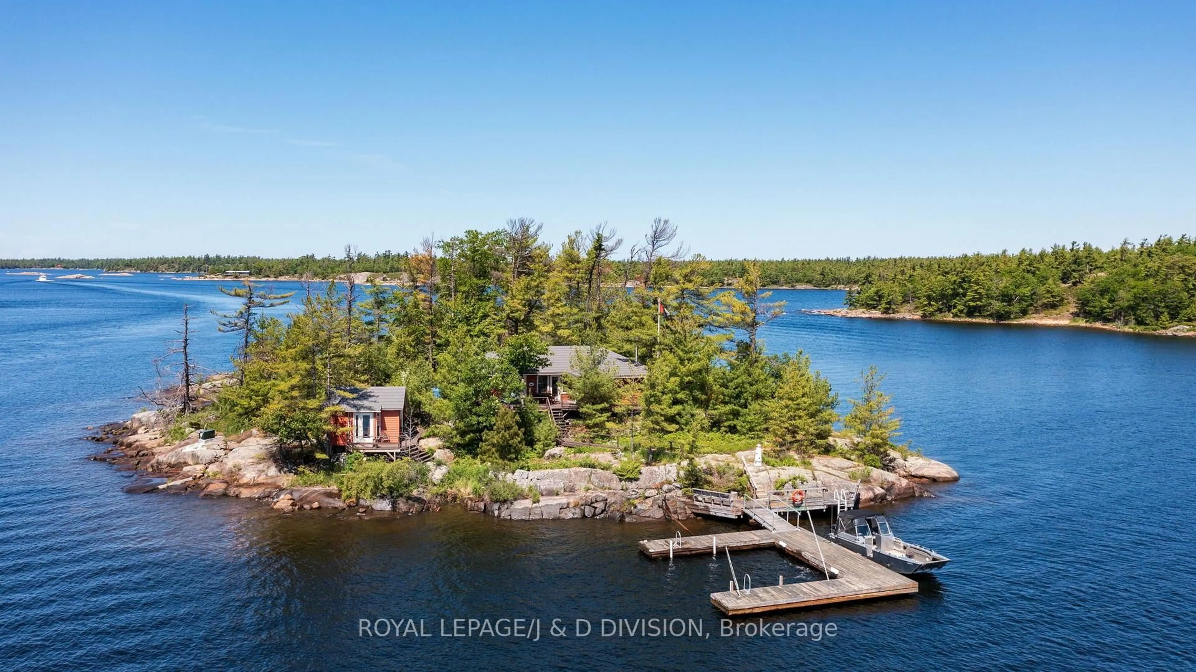 A pic from outside/outdoor area/front of a property/back of a property/a pic from drone, water/lake/river/ocean view for 1 B254 Emerald Island, The Archipelago Ontario P0C 1H0