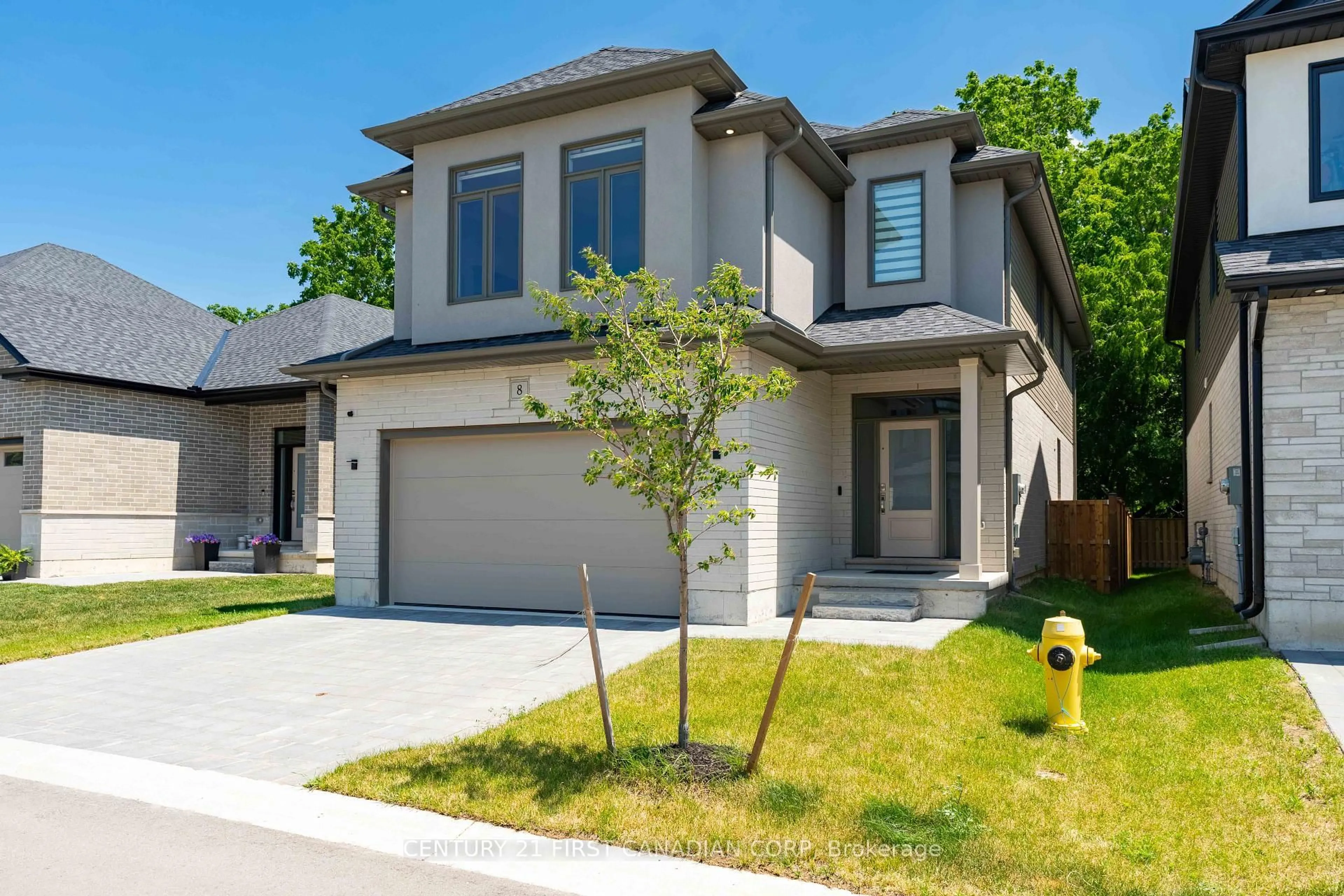 Home with brick exterior material, street for 8-7966 Fallon Dr, Lucan Biddulph Ontario N0M 1V0