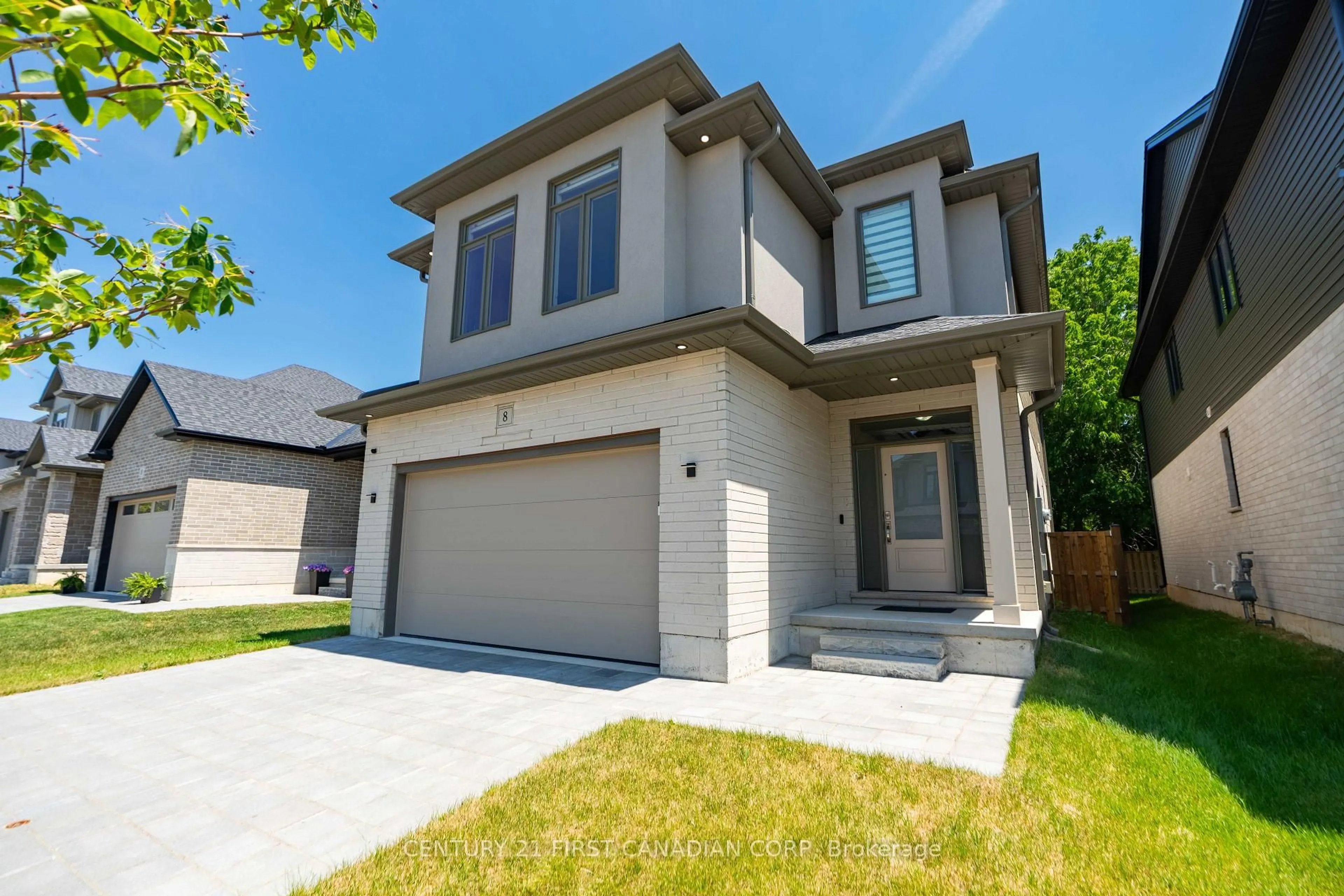 Home with brick exterior material, street for 8-7966 Fallon Dr, Lucan Biddulph Ontario N0M 1V0