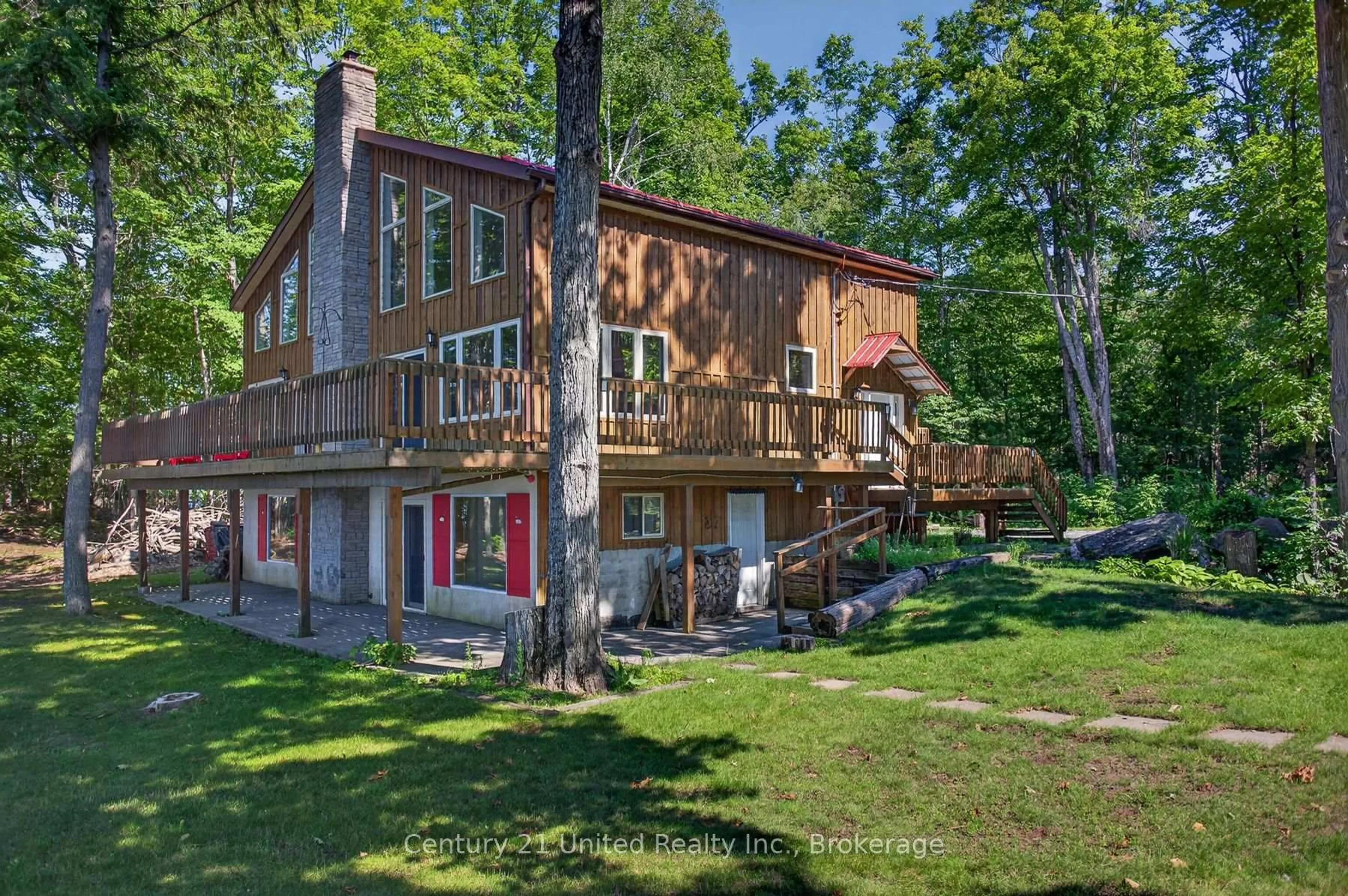 A pic from outside/outdoor area/front of a property/back of a property/a pic from drone, water/lake/river/ocean view for 2450 Victoria Springs Lane, Selwyn Ontario K0L 2H0