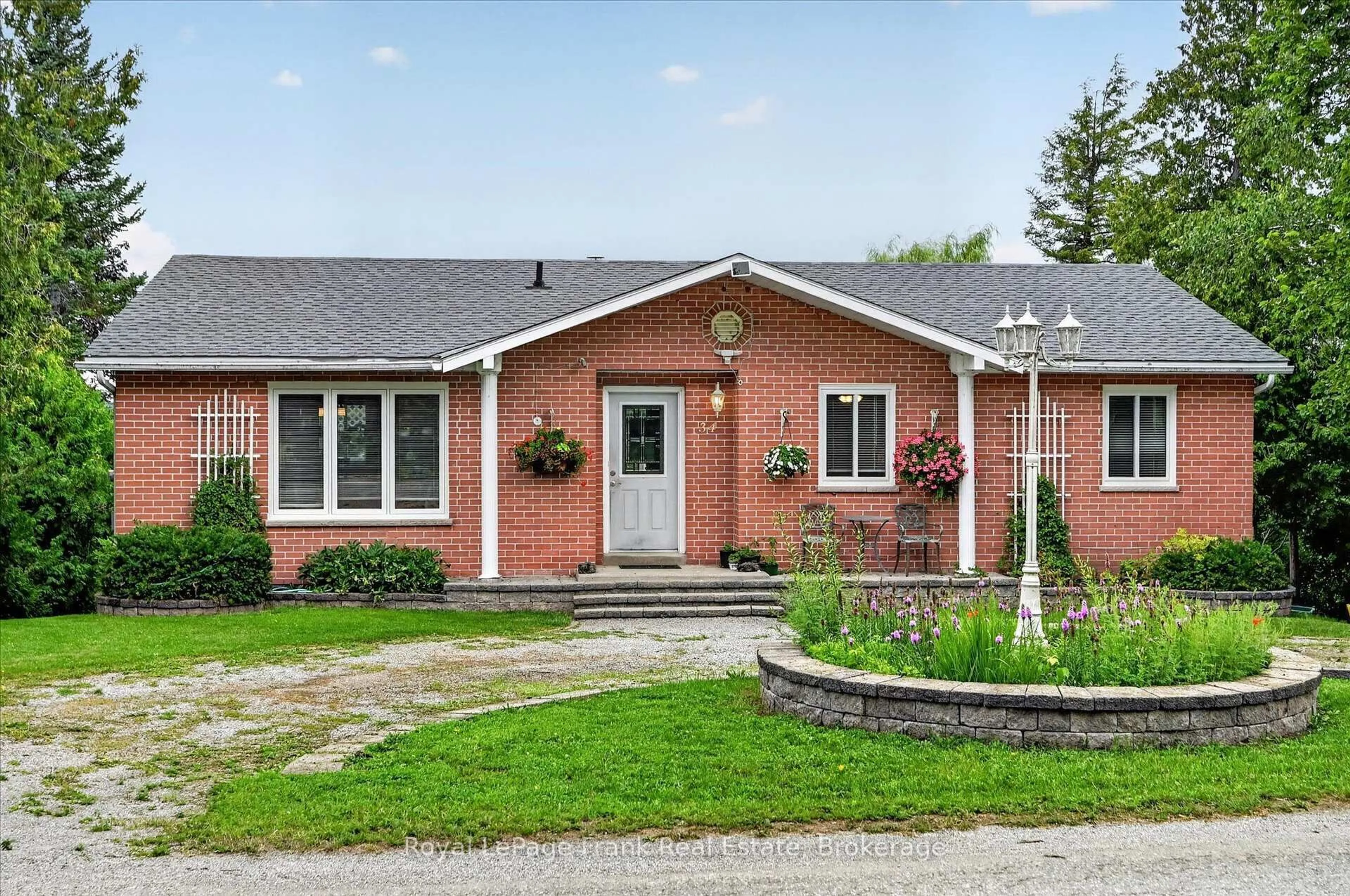 Home with brick exterior material, street for 34 Birch Point Dr, Kawartha Lakes Ontario K0L 1T0