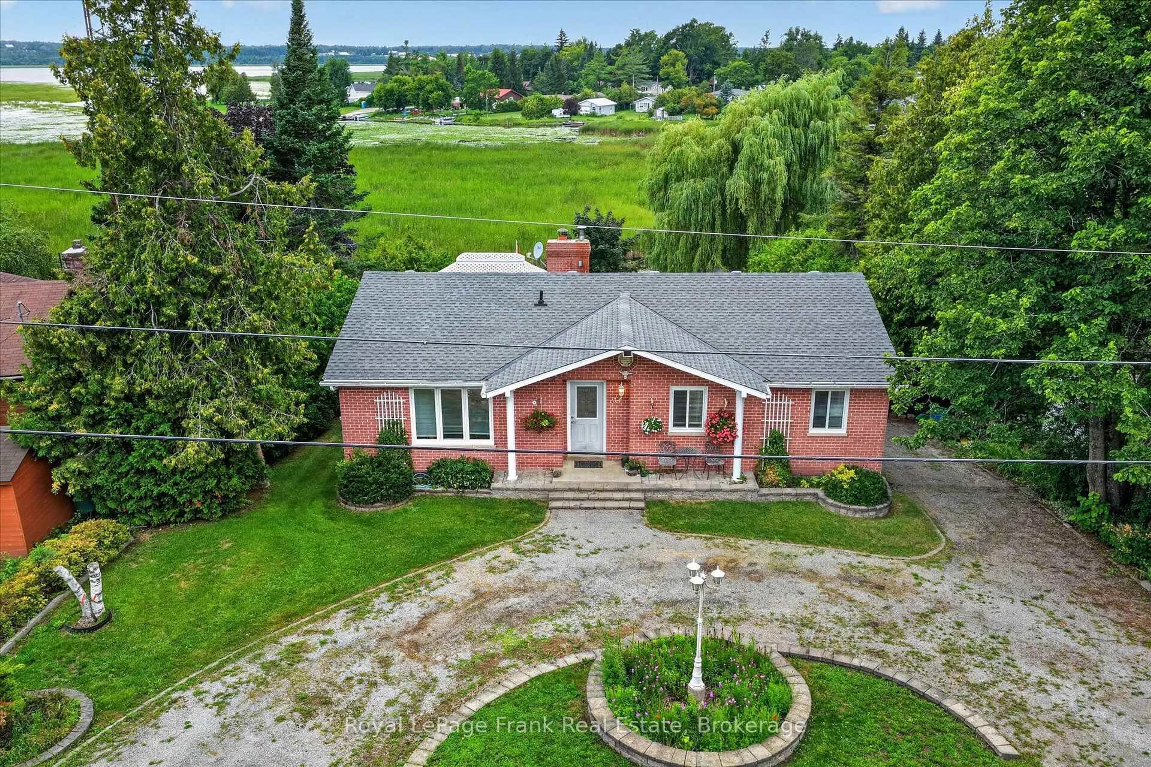 A pic from outside/outdoor area/front of a property/back of a property/a pic from drone, unknown for 34 Birch Point Dr, Kawartha Lakes Ontario K0L 1T0