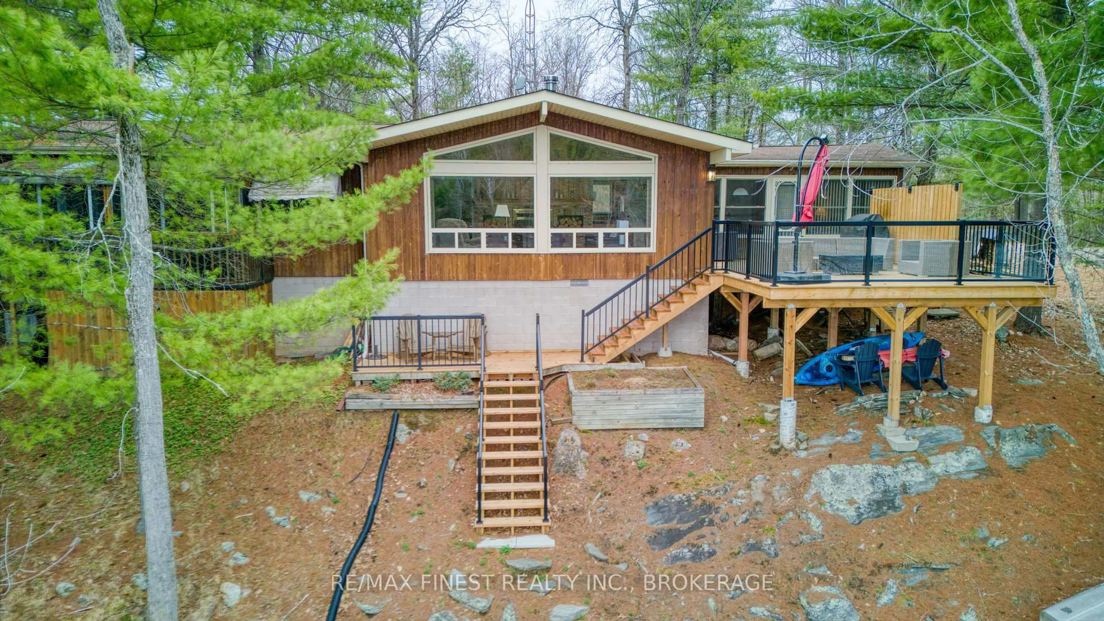 A pic from outside/outdoor area/front of a property/back of a property/a pic from drone, water/lake/river/ocean view for 1046 Turner Way, Arden Ontario K0H 1B0