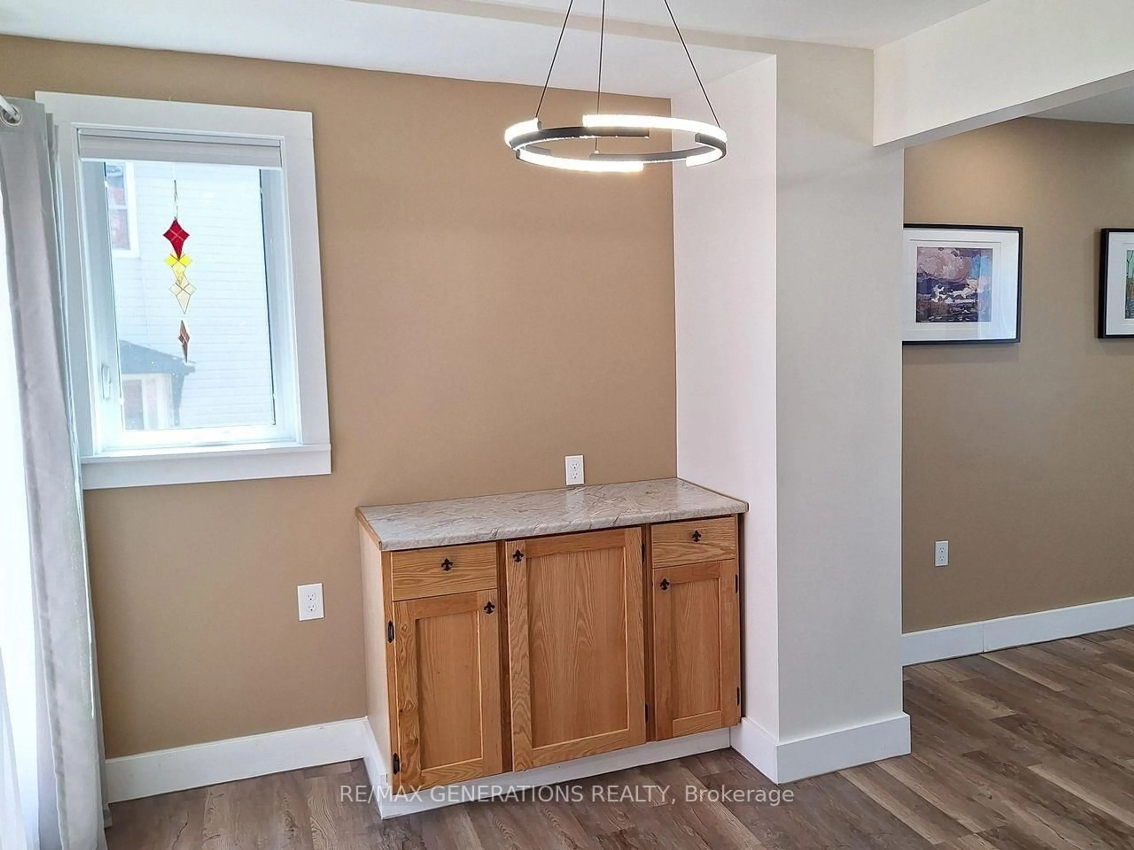 Open concept kitchen, wood/laminate floor for 15 Ross Ave, Marathon Ontario P0T 2E0