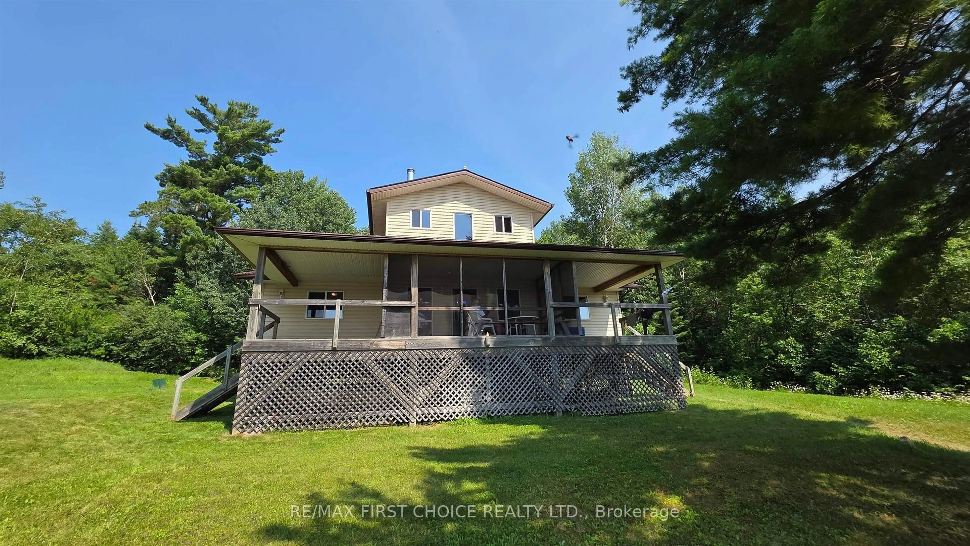 A pic from outside/outdoor area/front of a property/back of a property/a pic from drone, water/lake/river/ocean view for 2 Moore Bay, Sioux Narrows-Nestor Falls Ontario P0X 1H0