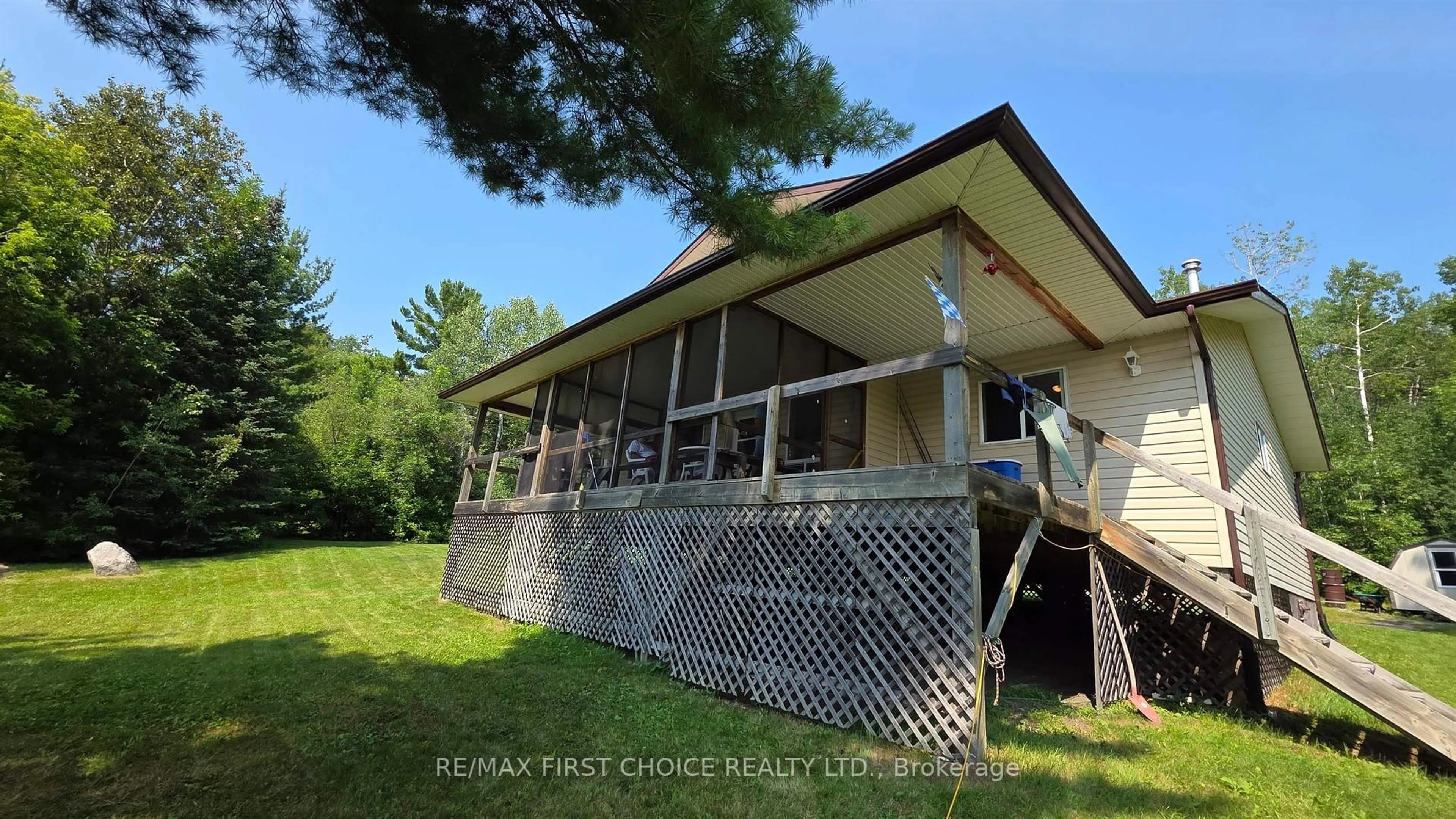 A pic from outside/outdoor area/front of a property/back of a property/a pic from drone, water/lake/river/ocean view for 2 Moore Bay, Sioux Narrows-Nestor Falls Ontario P0X 1H0