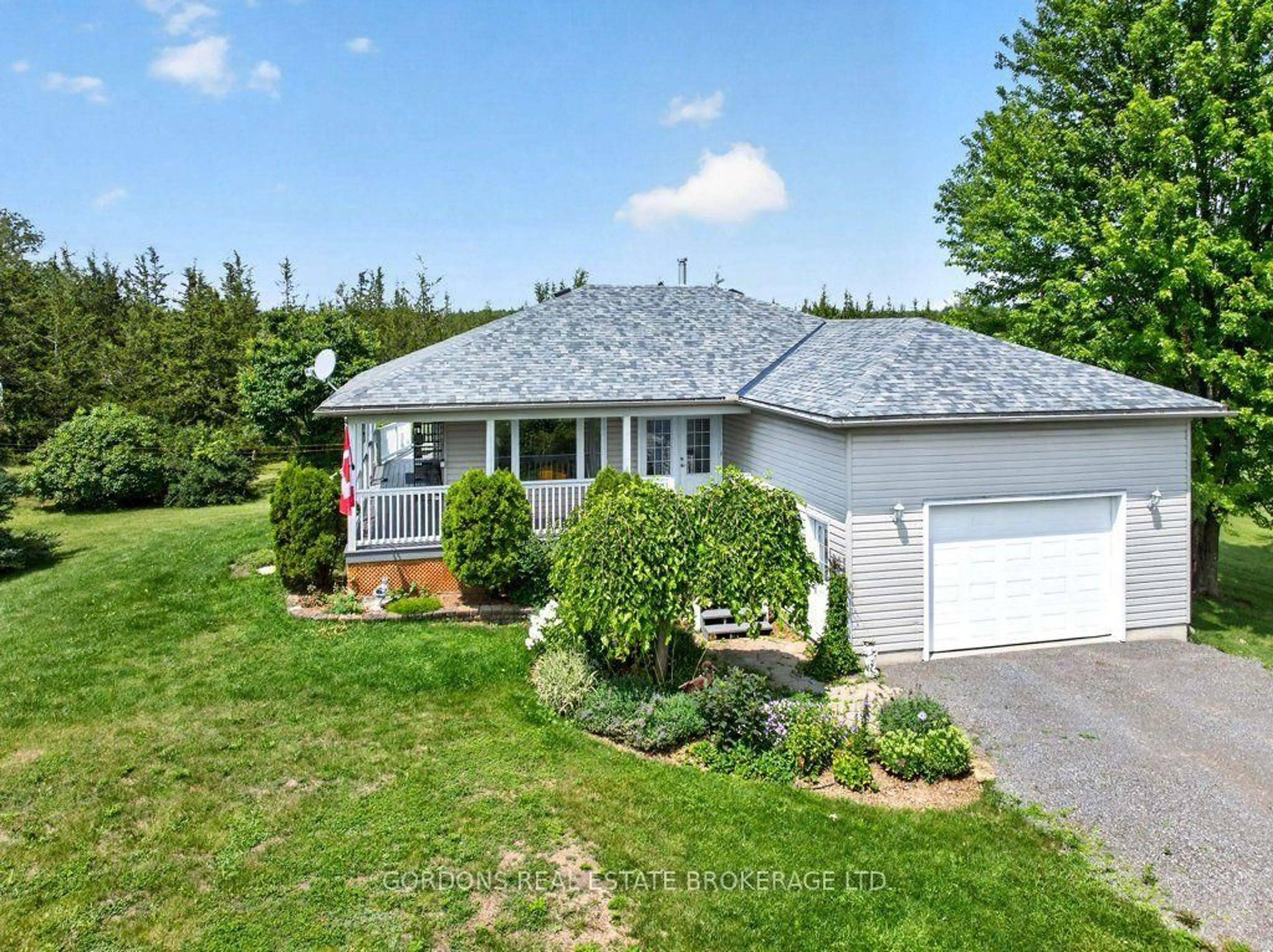 A pic from outside/outdoor area/front of a property/back of a property/a pic from drone, street for 467 Denridge Rd, Stone Mills Ontario K0K 2Z0