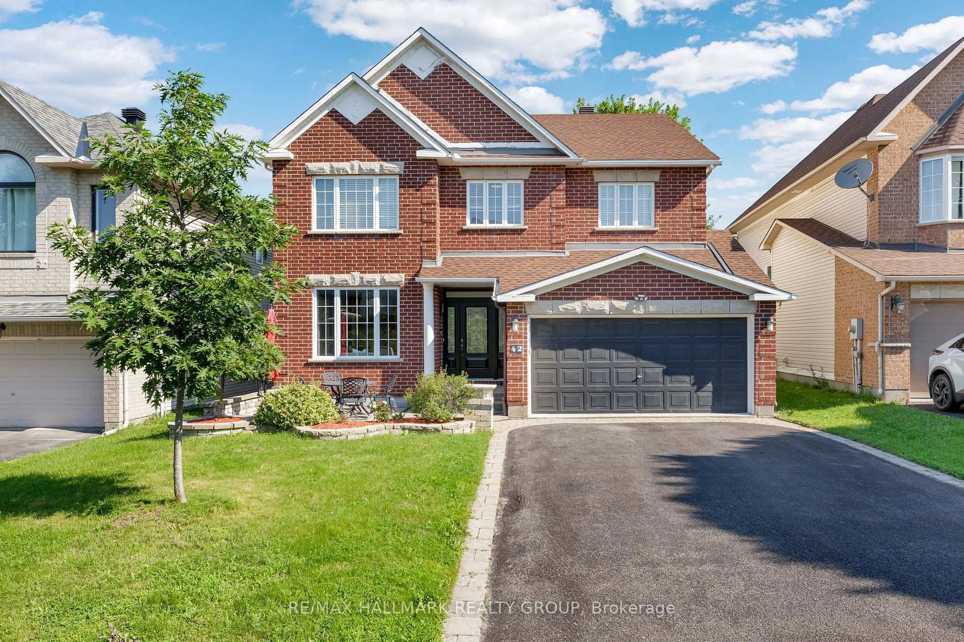 Home with brick exterior material, street for 42 Glenrill Pl, Ottawa Ontario K2M 2T5
