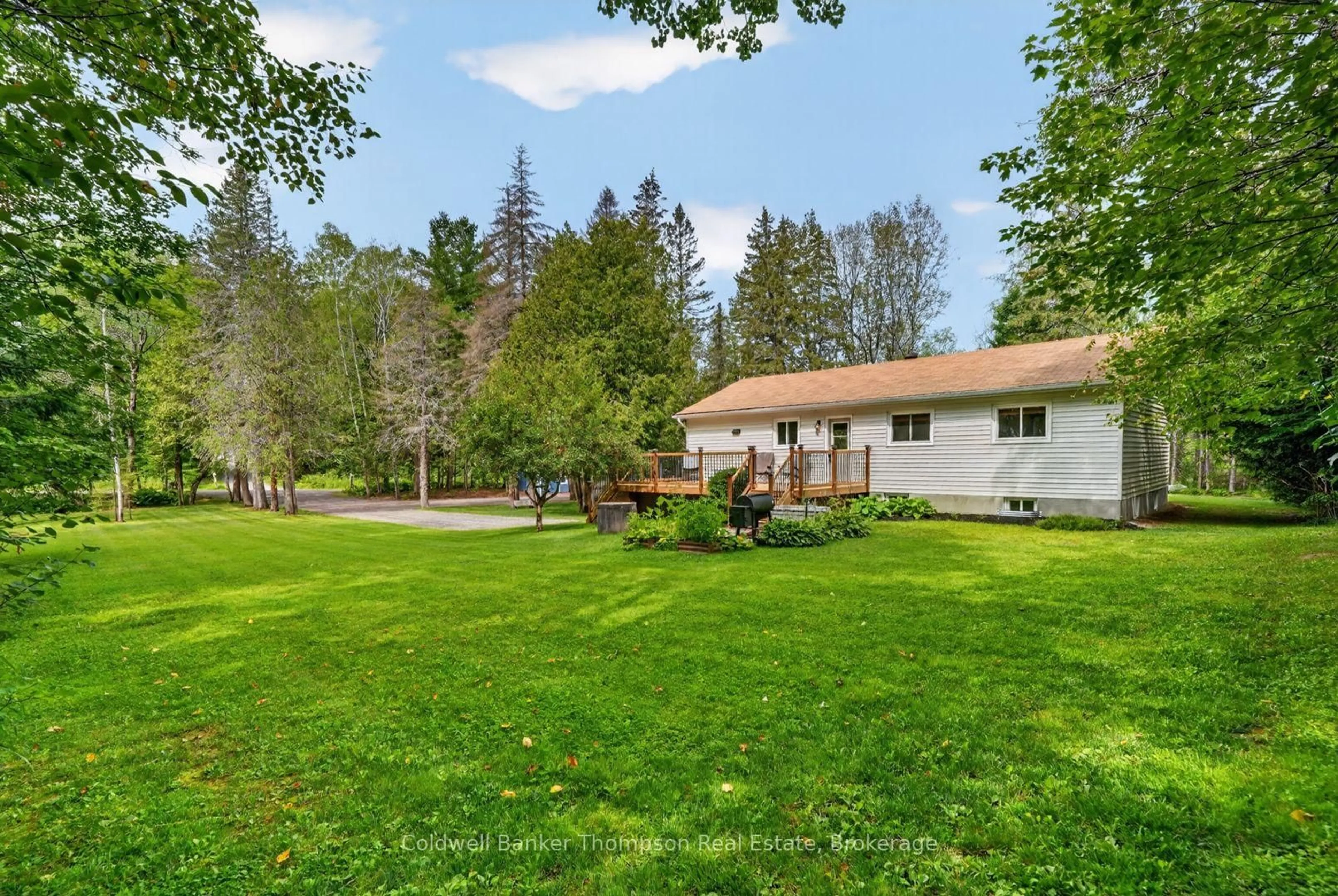 A pic from outside/outdoor area/front of a property/back of a property/a pic from drone, unknown for 15 Orr Rd, Huntsville Ontario P0B 1M0