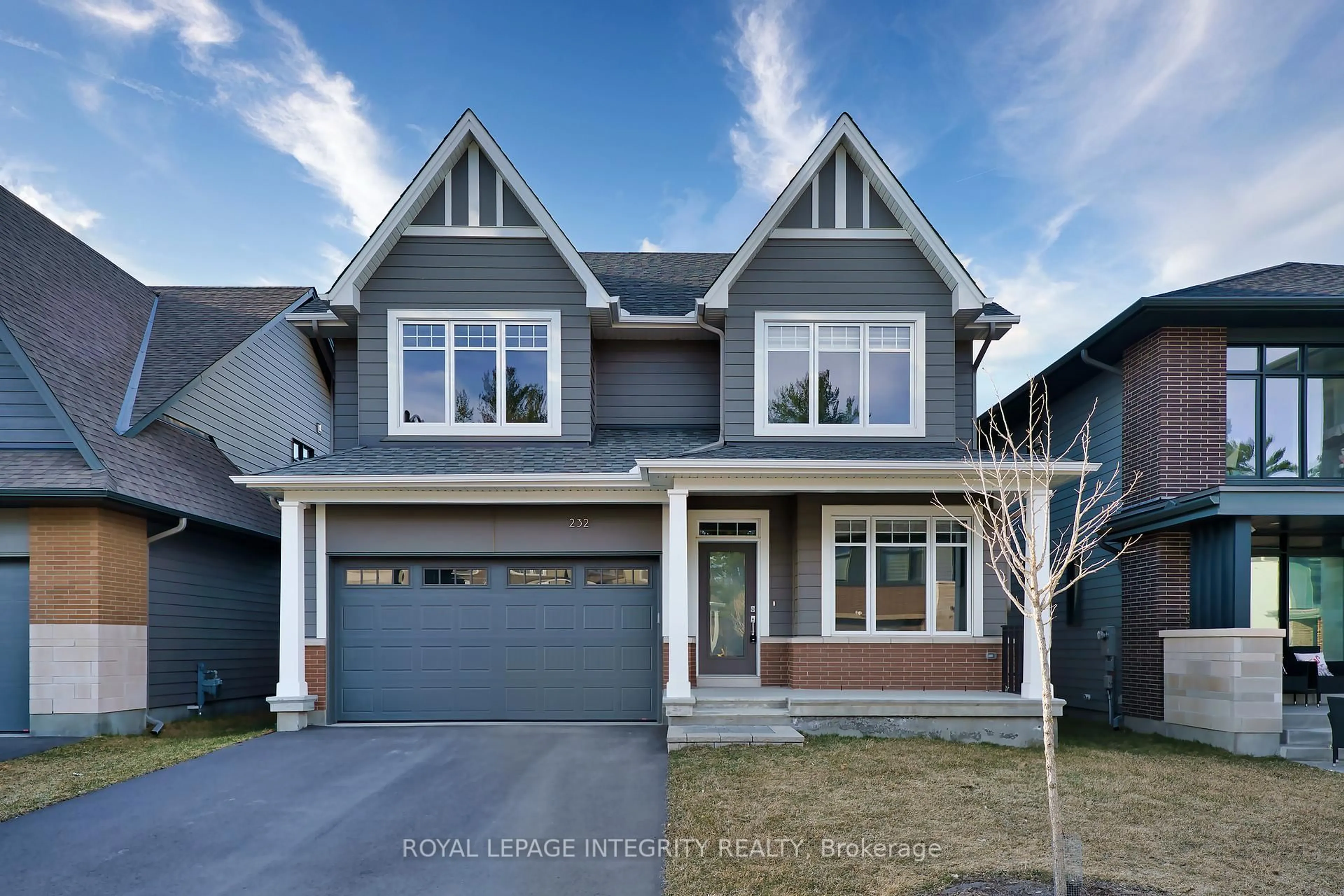 Home with vinyl exterior material, street for 232 KETCHIKAN Cres, Ottawa Ontario K2T 0S3