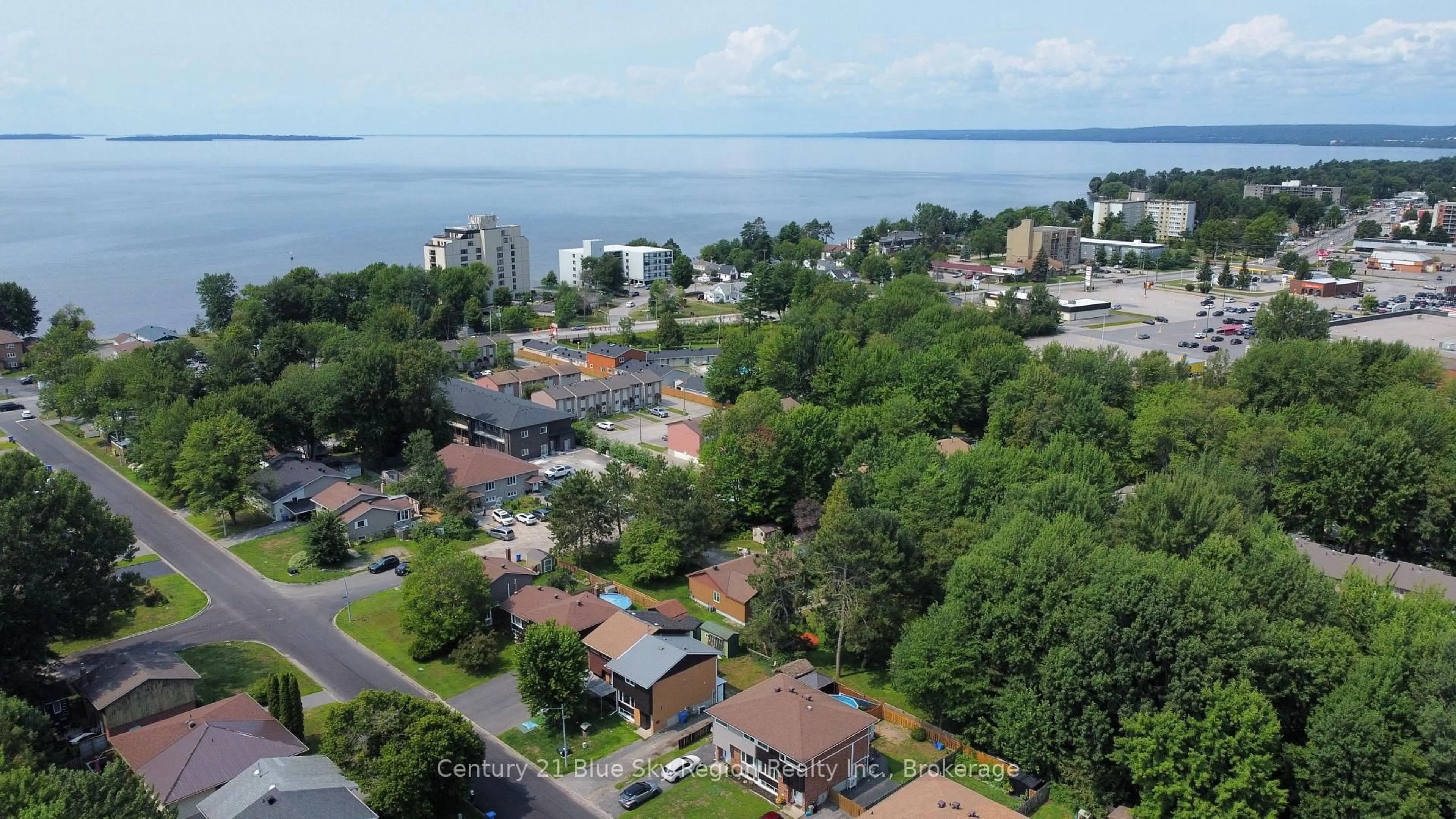 A pic from outside/outdoor area/front of a property/back of a property/a pic from drone, water/lake/river/ocean view for 28 Lovell Ave, North Bay Ontario P1A 3R8