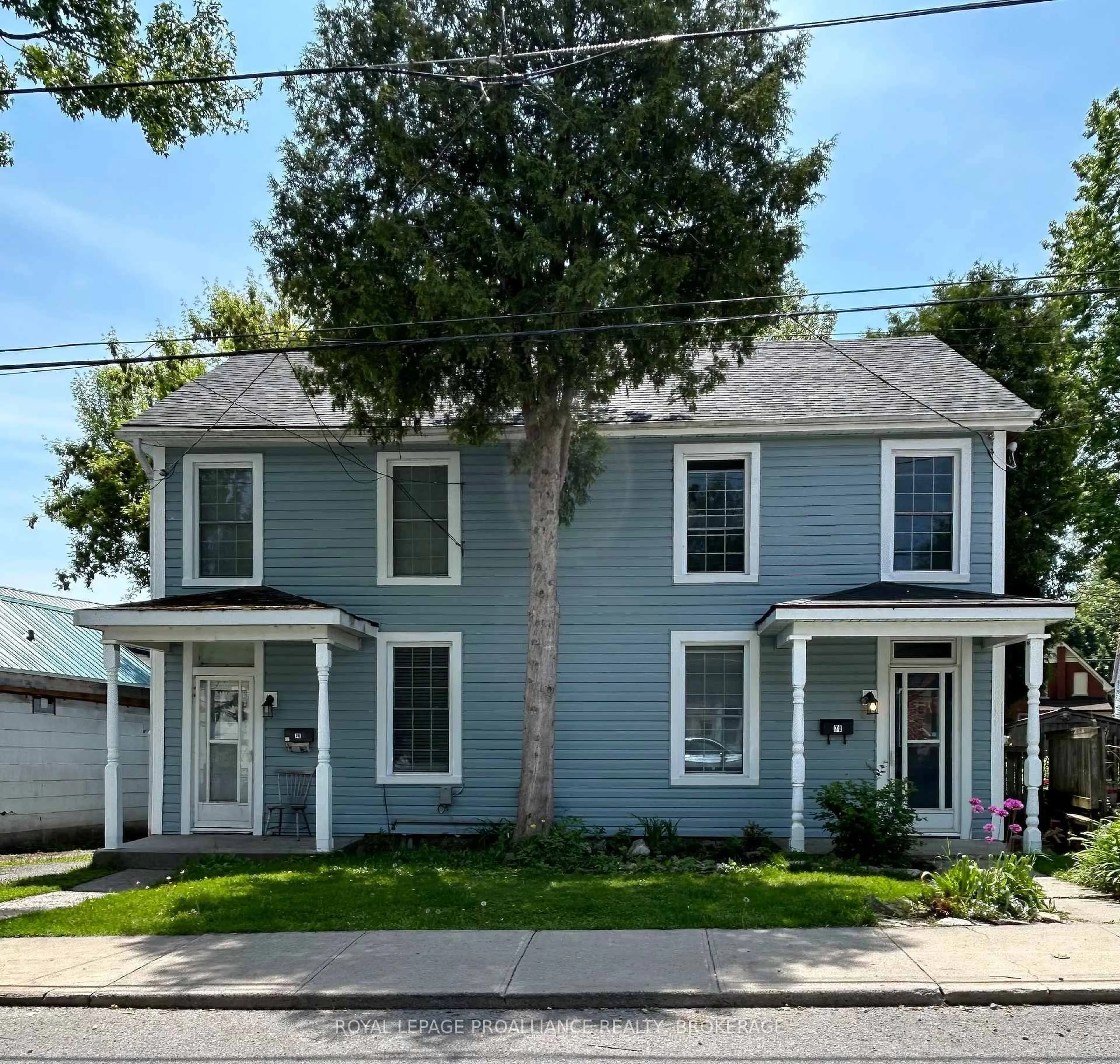 Home with vinyl exterior material, street for 76-78 North St, Kingston Ontario K7K 1J9