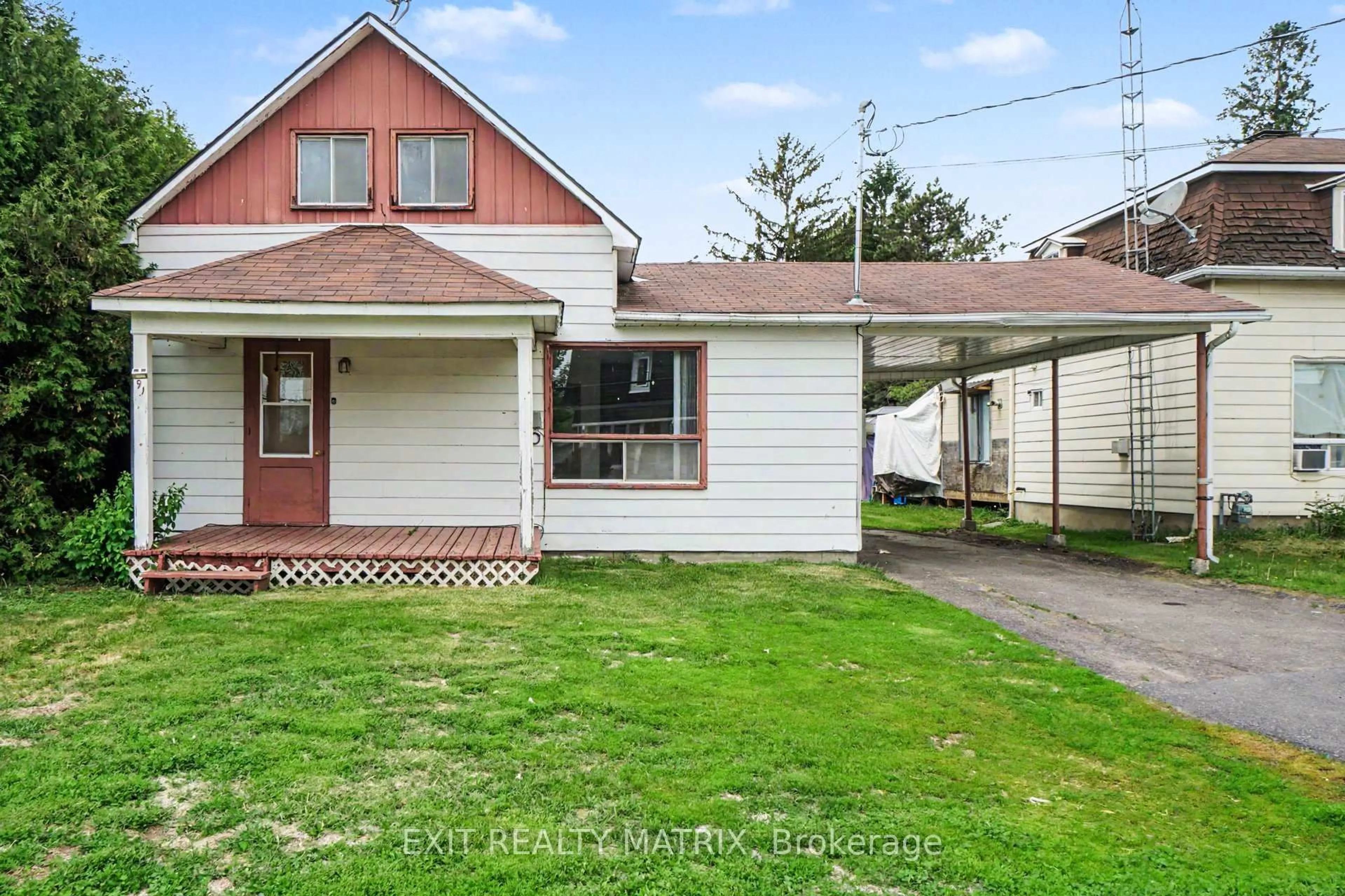 Home with vinyl exterior material, street for 91 Laurier St, Casselman Ontario K0A 1M0