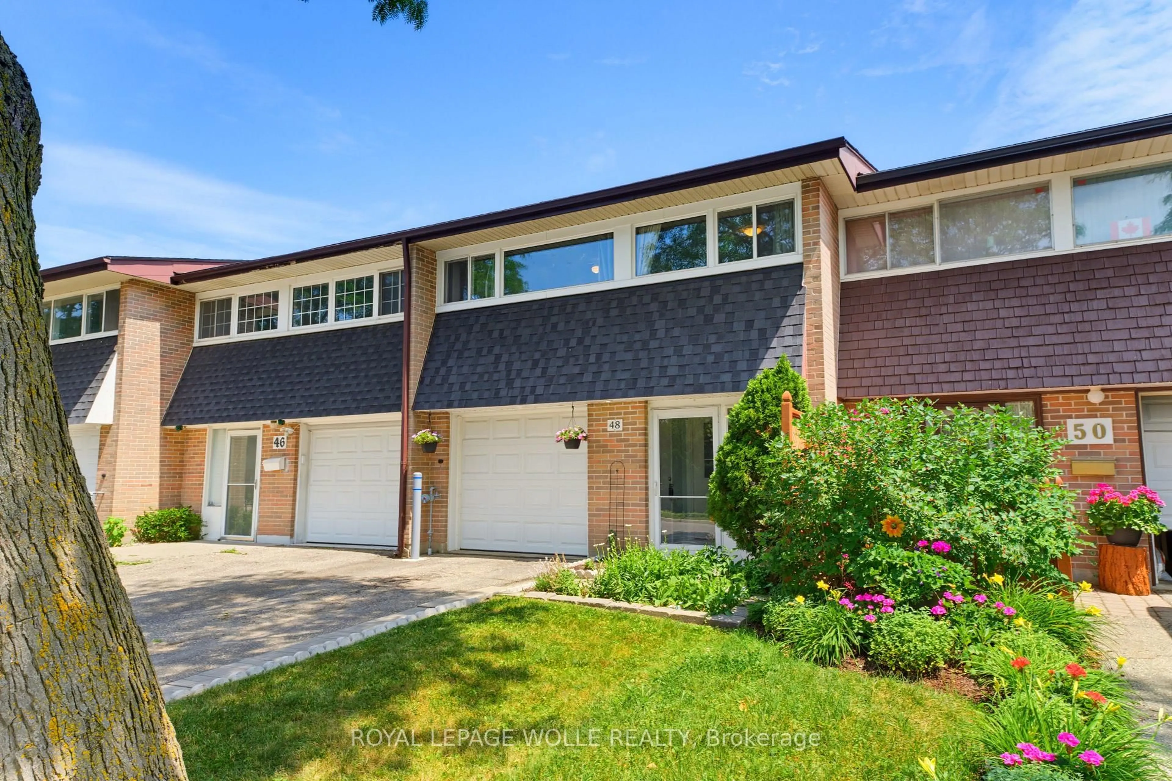Home with brick exterior material, street for 48 Guerin Ave, Kitchener Ontario N2A 1S8