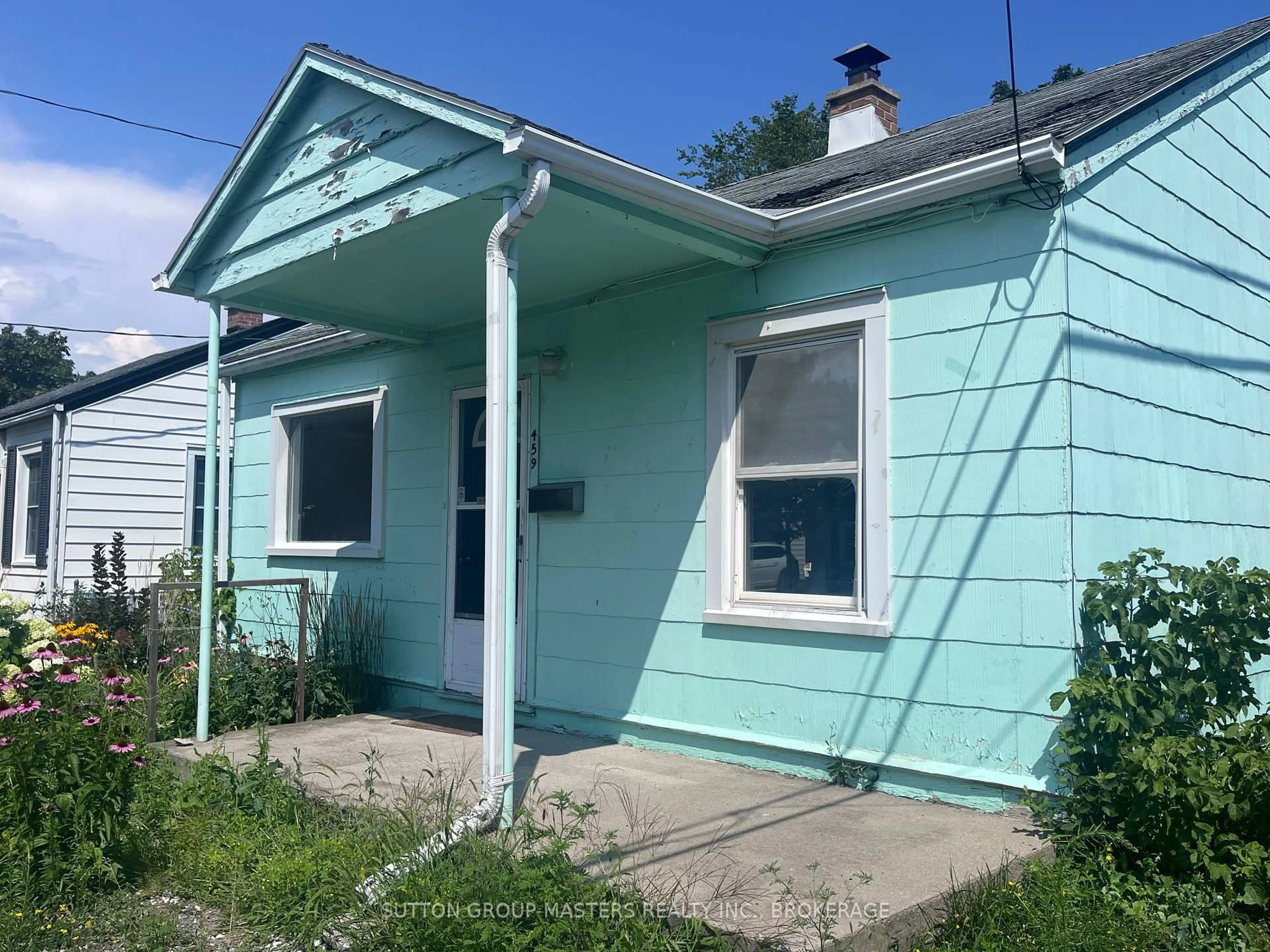 Home with vinyl exterior material, street for 459 Nelson St, Kingston Ontario K7K 4N4