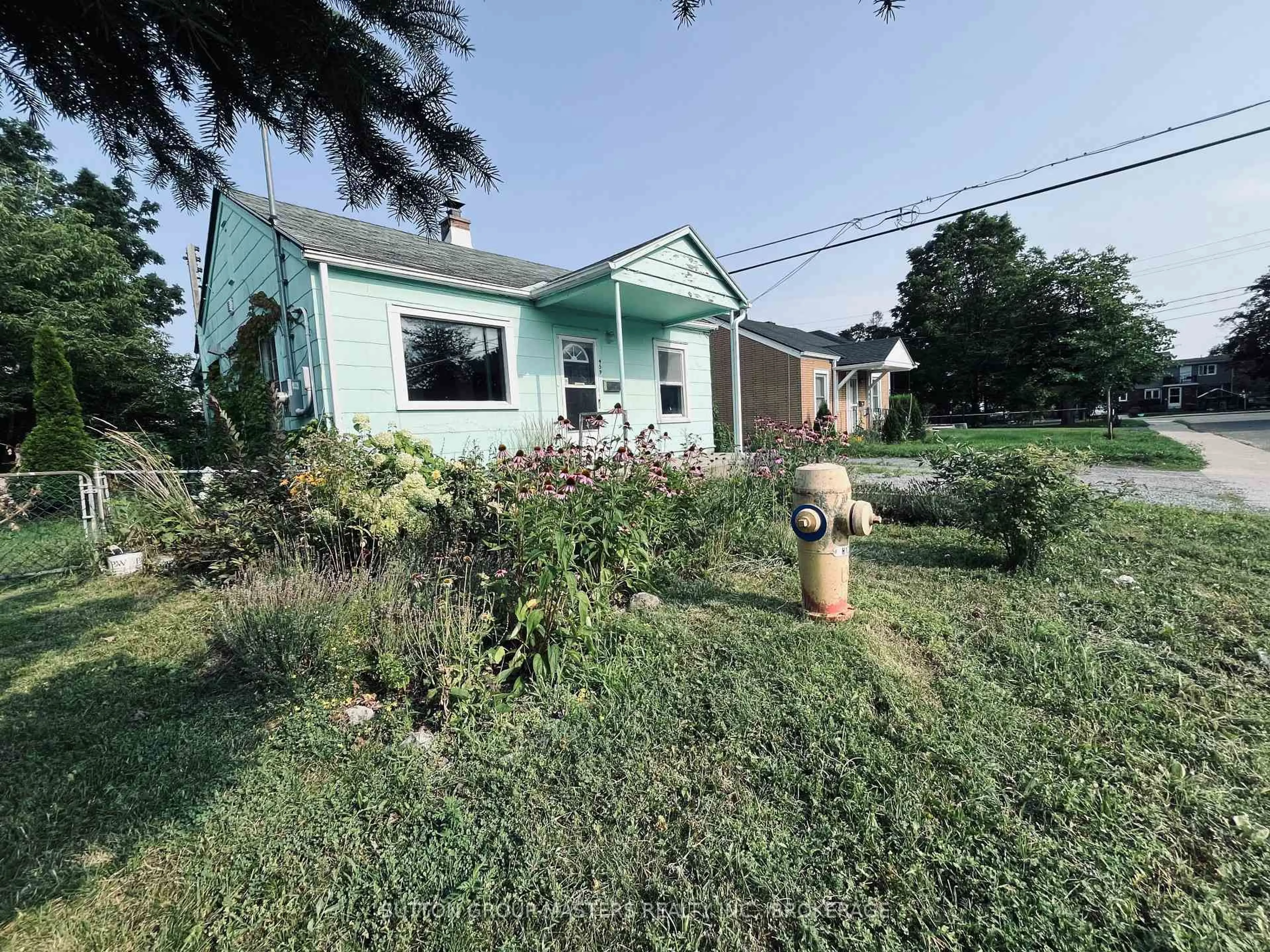 A pic from outside/outdoor area/front of a property/back of a property/a pic from drone, street for 459 Nelson St, Kingston Ontario K7K 4N4