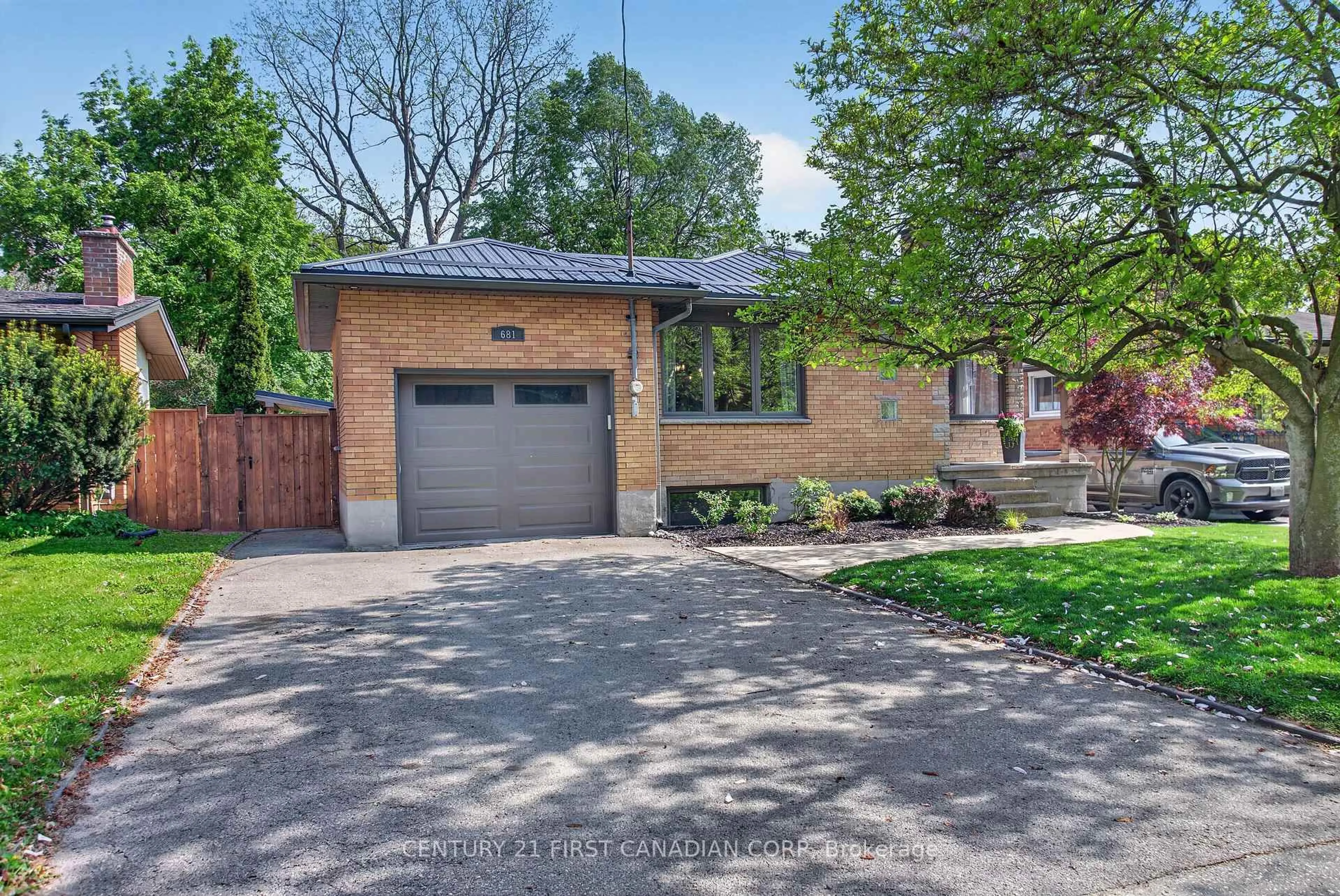 Home with brick exterior material, street for 681 Brant St, London East Ontario N5Y 3M9