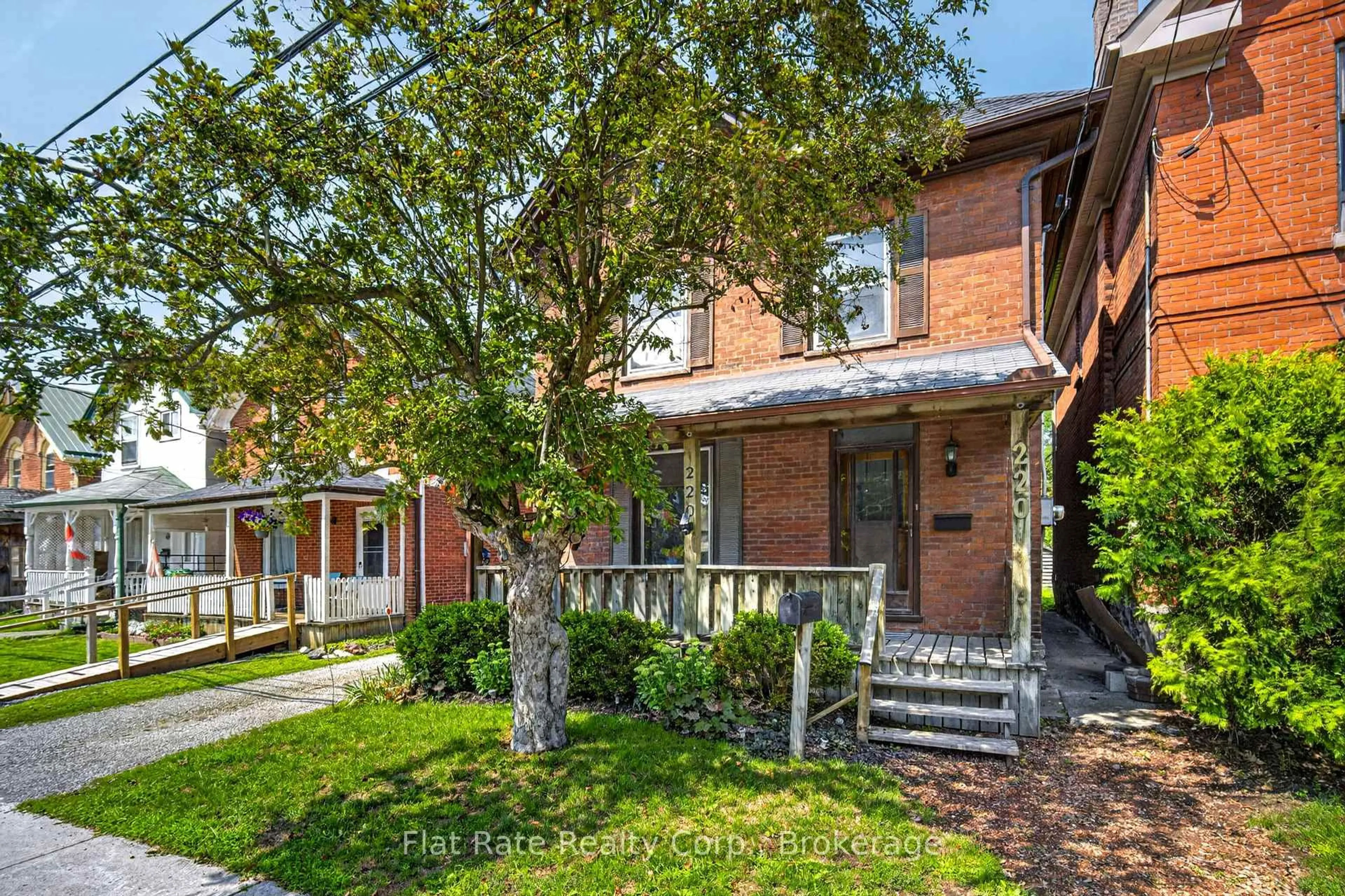 Home with brick exterior material, street for 220 LONDON St, Peterborough Ontario K9H 2Y9