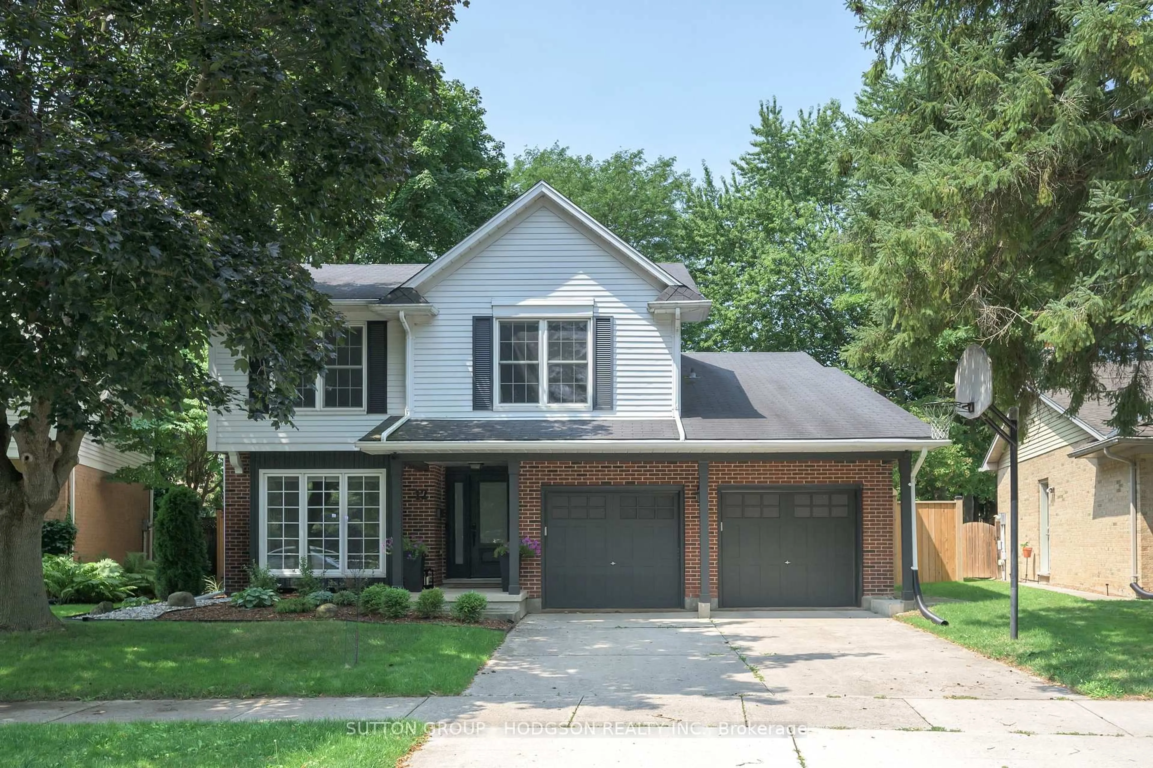Home with brick exterior material, street for 12 Spencer Cres, London North Ontario N5X 2K6