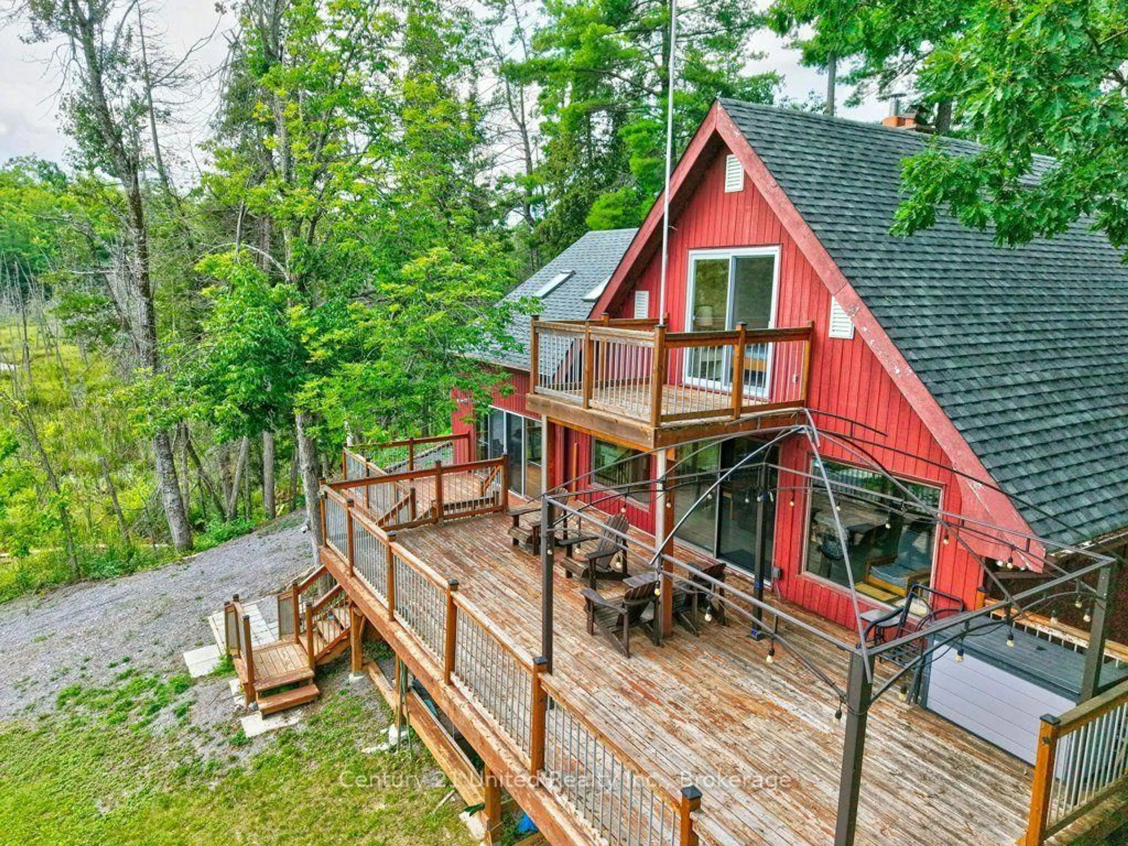A pic from outside/outdoor area/front of a property/back of a property/a pic from drone, water/lake/river/ocean view for 38 Fire Route 37, North Kawartha Ontario K0L 3E0