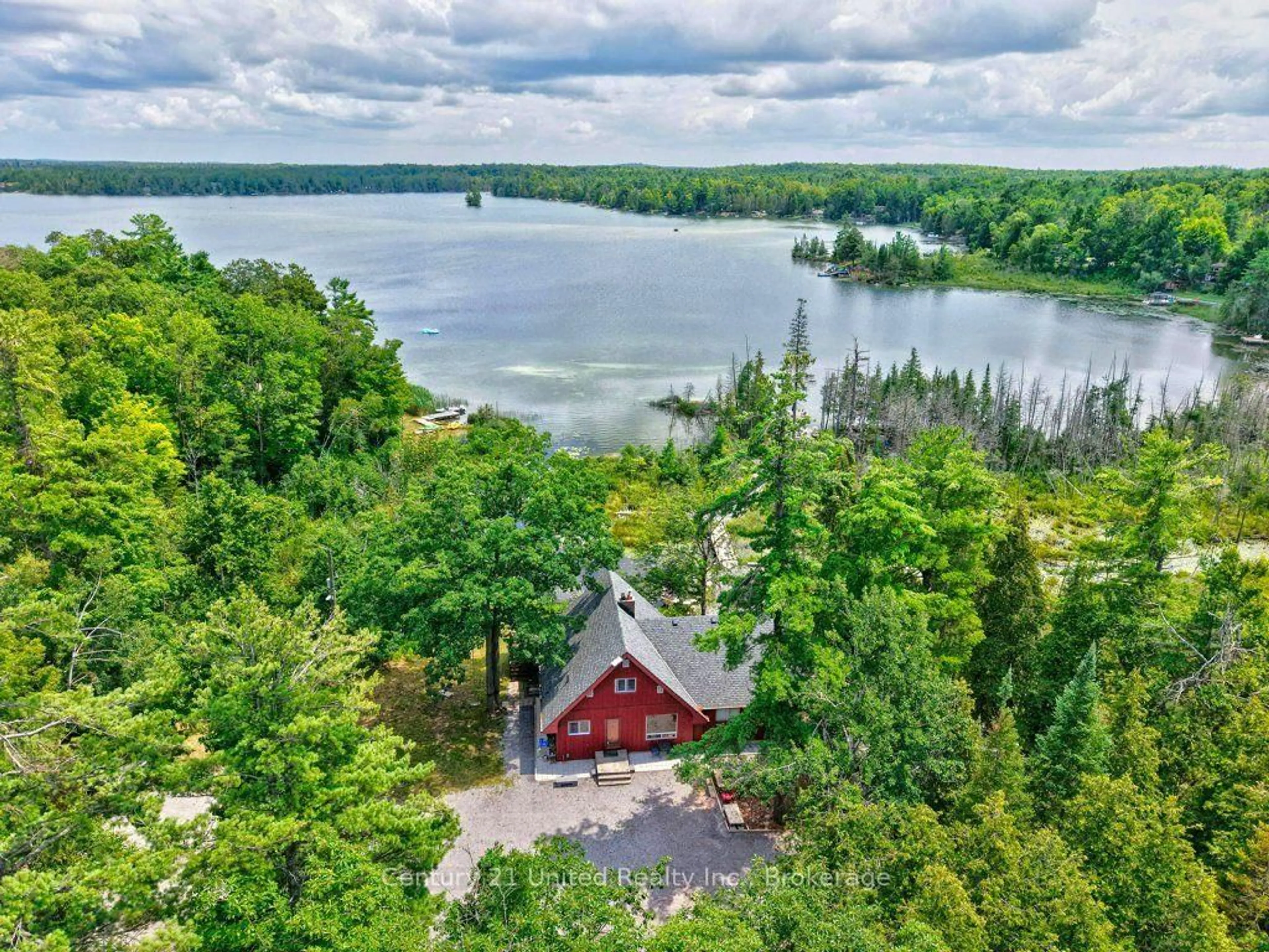 A pic from outside/outdoor area/front of a property/back of a property/a pic from drone, water/lake/river/ocean view for 38 Fire Route 37, North Kawartha Ontario K0L 3E0