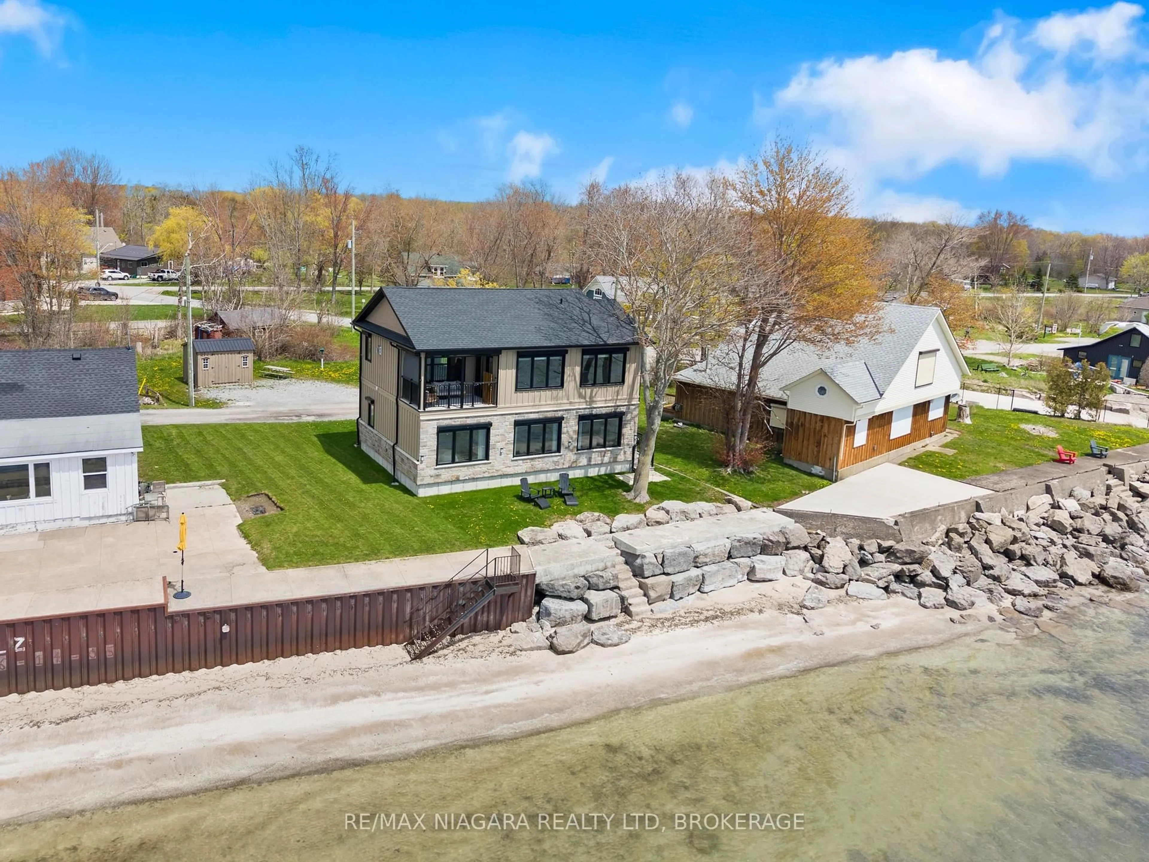 A pic from outside/outdoor area/front of a property/back of a property/a pic from drone, water/lake/river/ocean view for 11605 Beach Rd, Wainfleet Ontario L0S 1V0