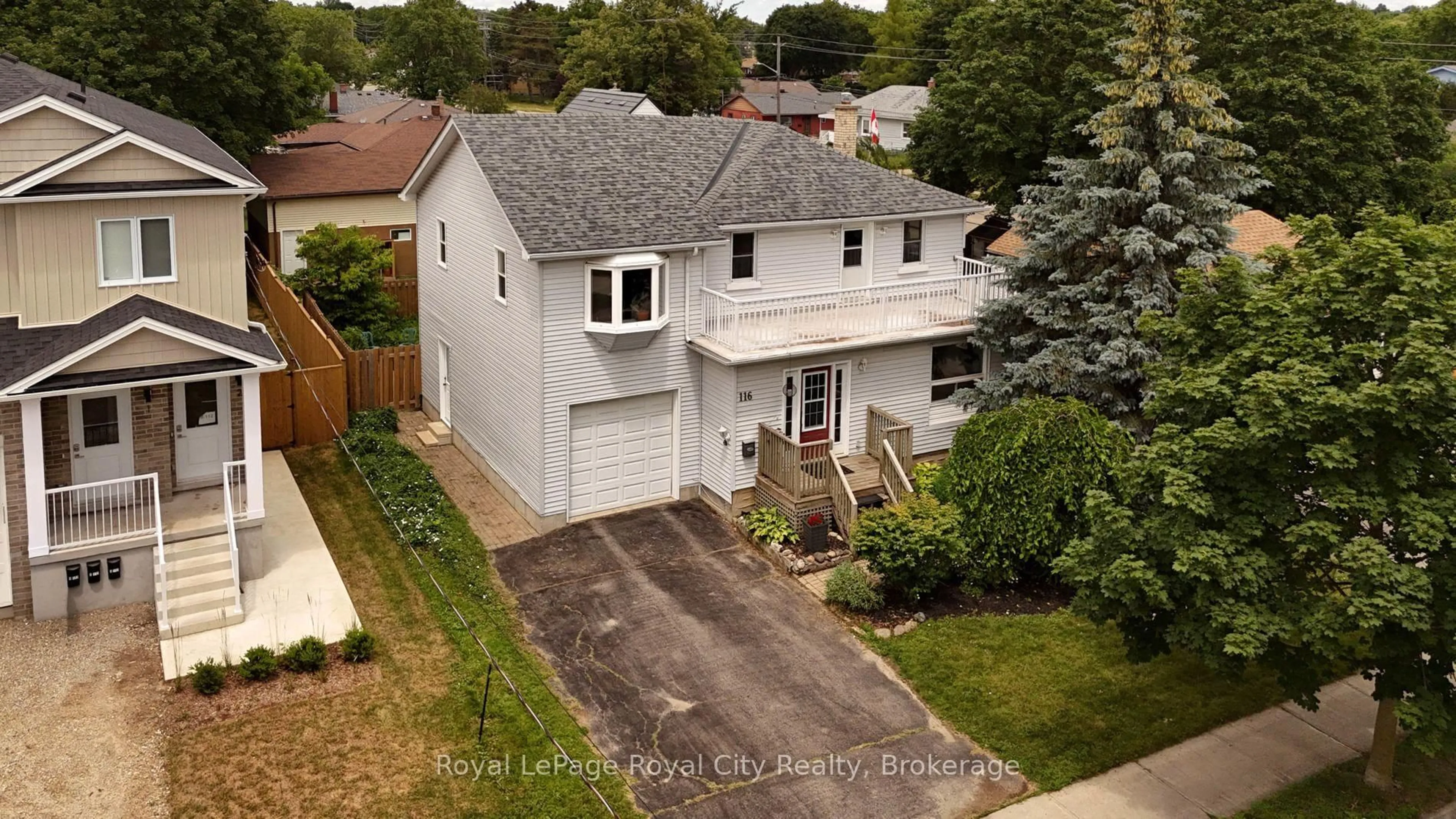 A pic from outside/outdoor area/front of a property/back of a property/a pic from drone, street for 116 Emma St, Guelph Ontario N1E 1T8