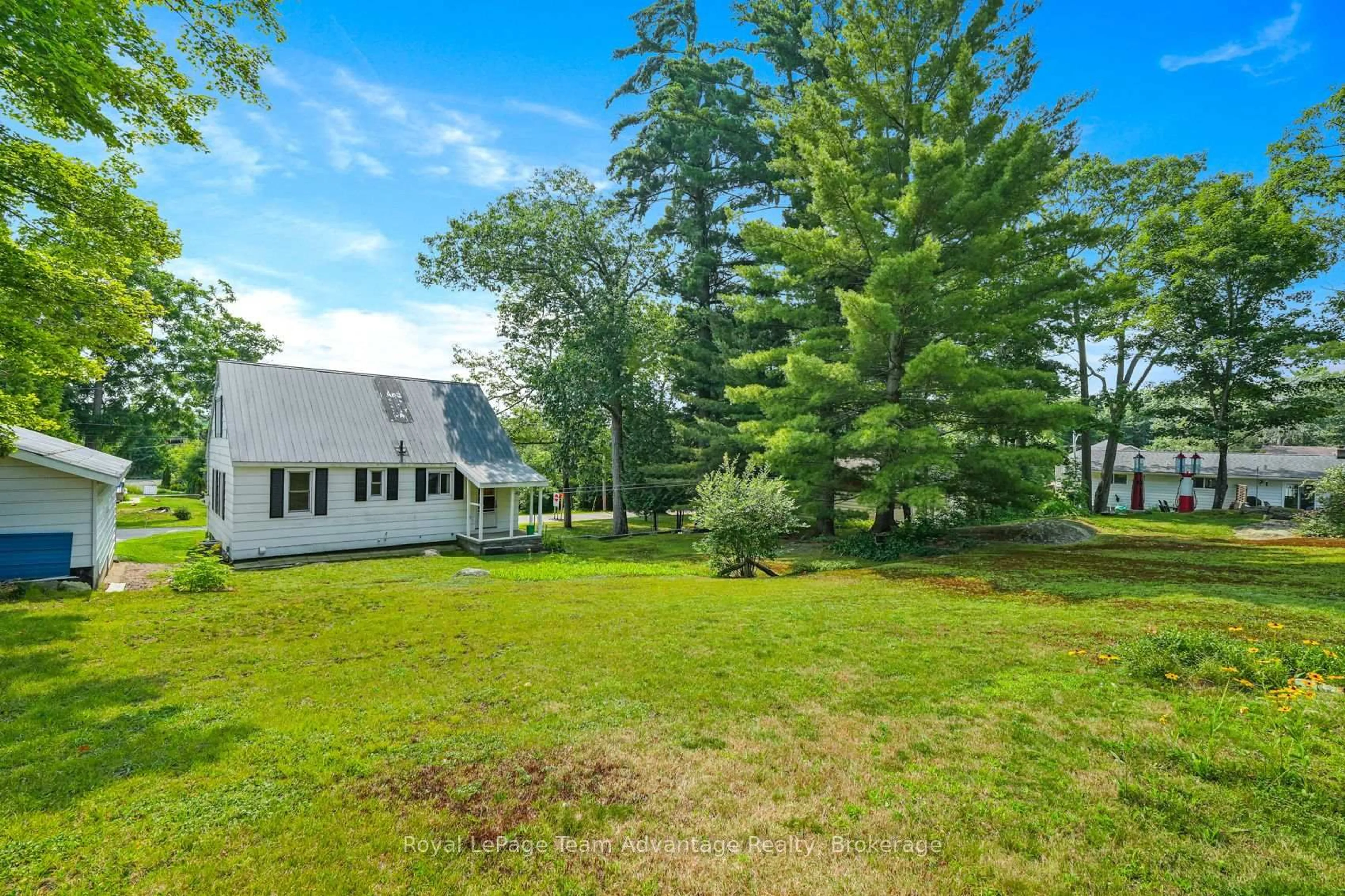 A pic from outside/outdoor area/front of a property/back of a property/a pic from drone, water/lake/river/ocean view for 13 Burritt St, Parry Sound Ontario P2A 1N5