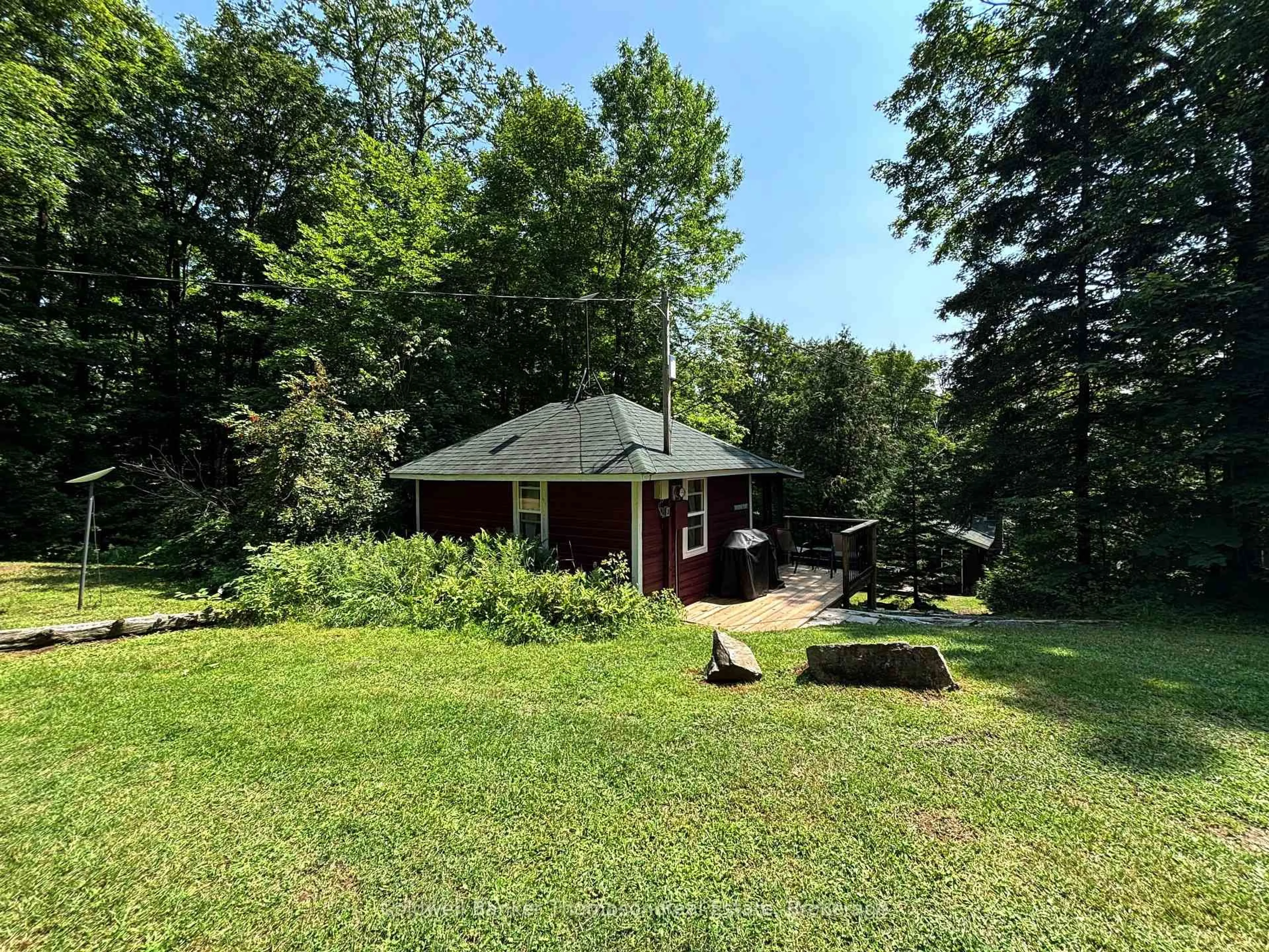 A pic from outside/outdoor area/front of a property/back of a property/a pic from drone, forest/trees view for 1341 Billie Bear Rd, Lake of Bays Ontario P1H 2J6