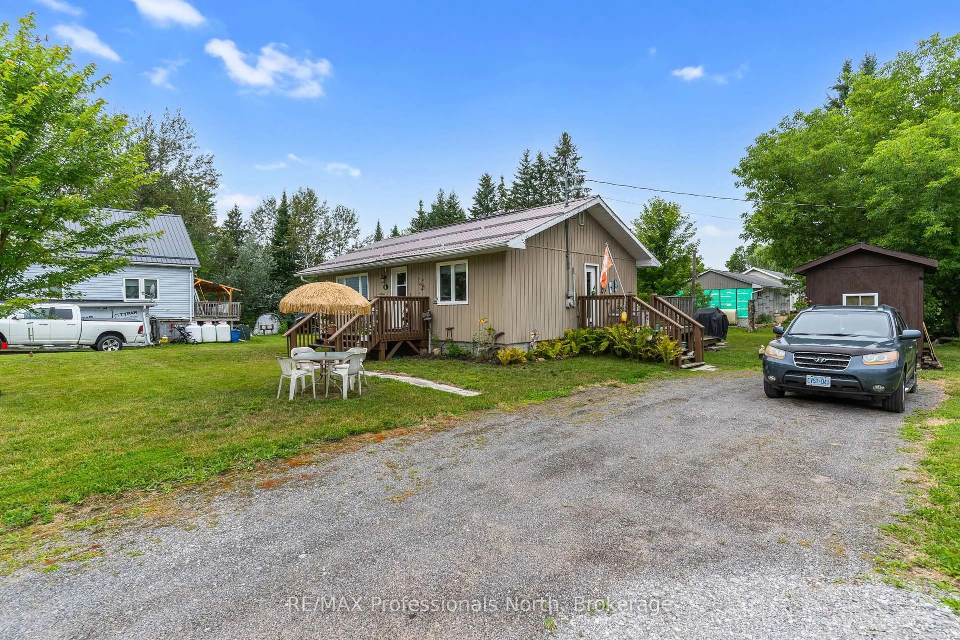 A pic from outside/outdoor area/front of a property/back of a property/a pic from drone, unknown for 1B Lyons St, Minden Hills Ontario K0M 2K0