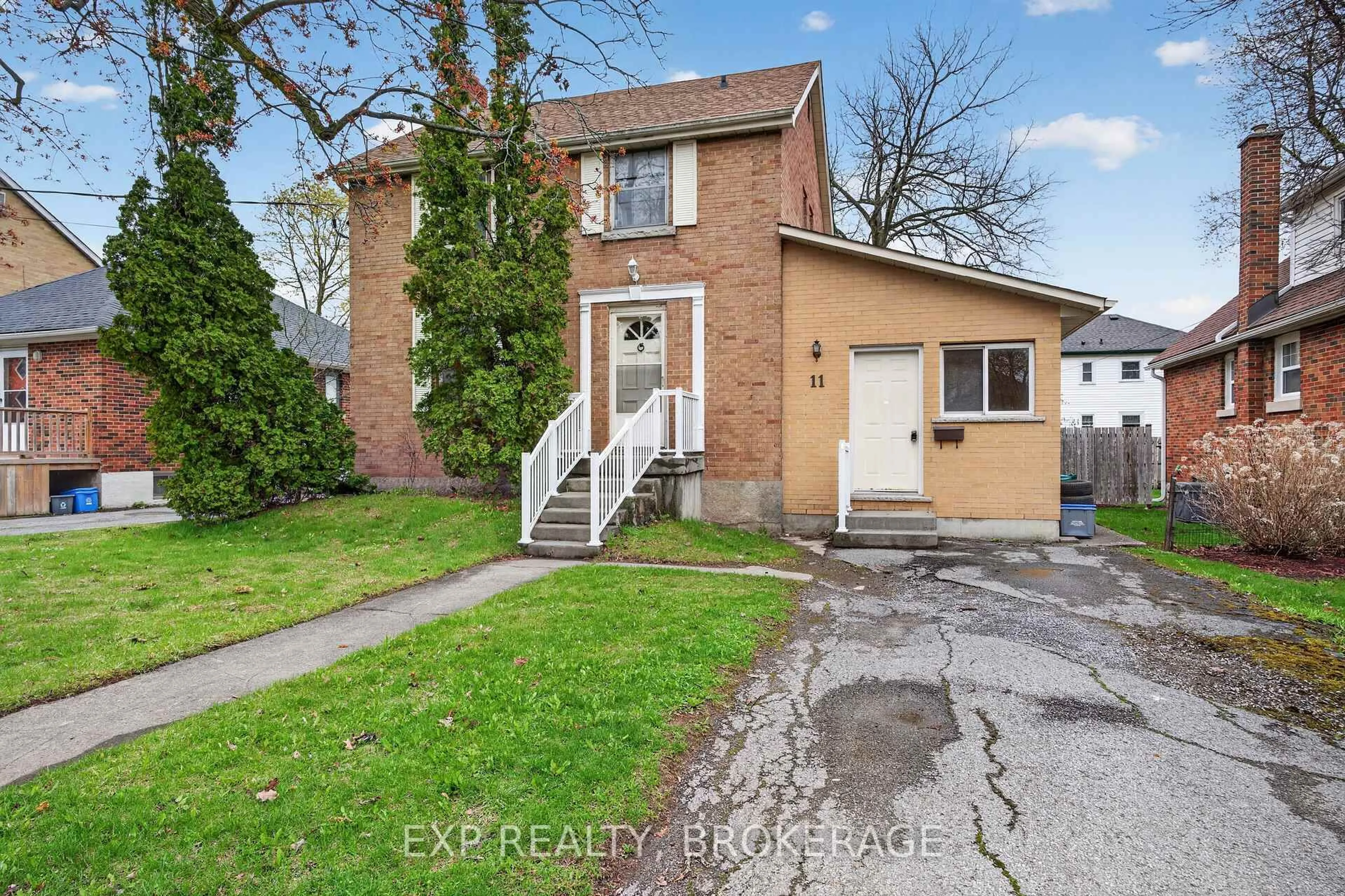A pic from outside/outdoor area/front of a property/back of a property/a pic from drone, street for 11 CARRUTHERS Ave, Kingston Ontario K7L 1L9