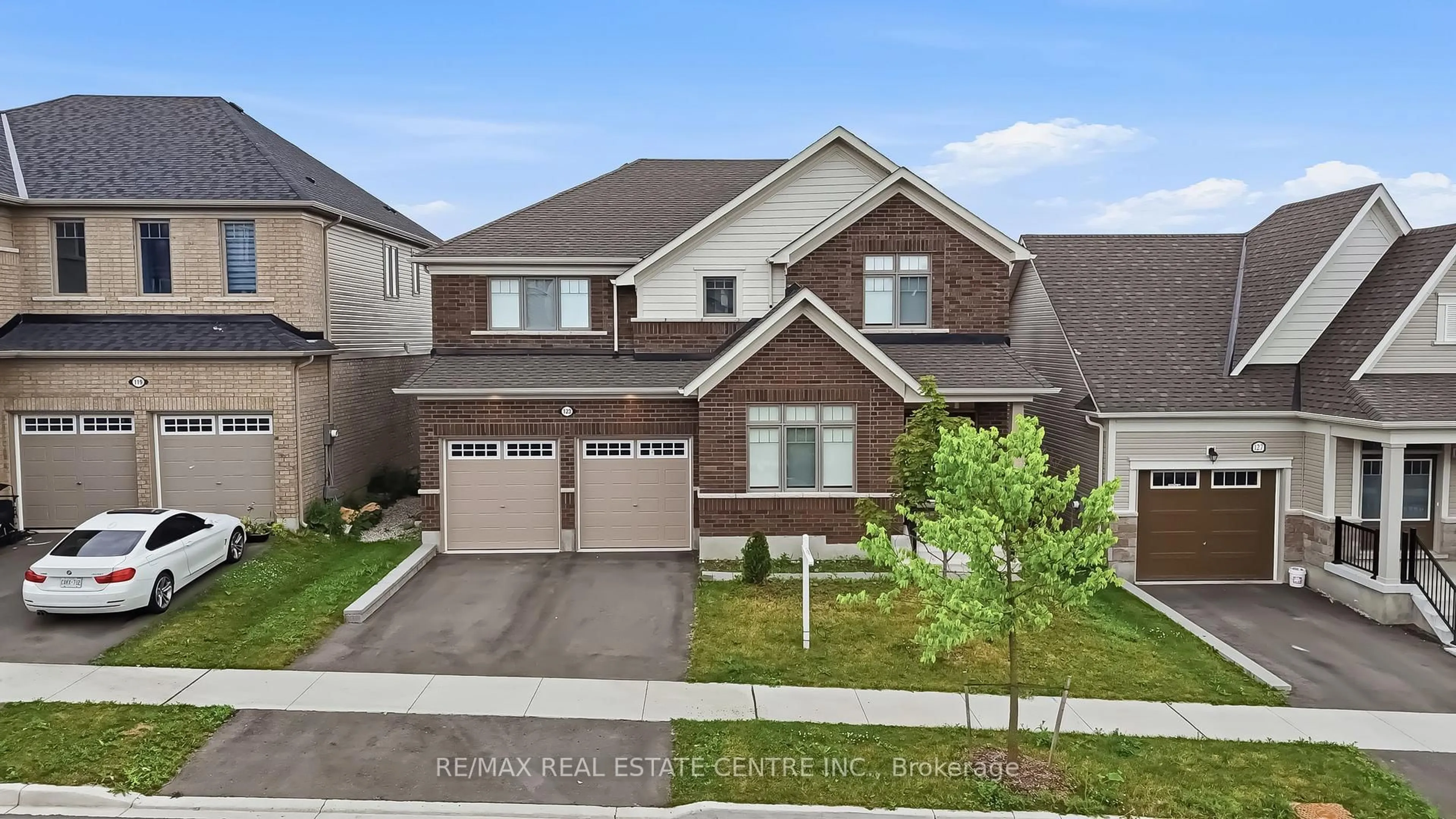 Home with brick exterior material, street for 123 REA Dr, Centre Wellington Ontario N1M 0J8