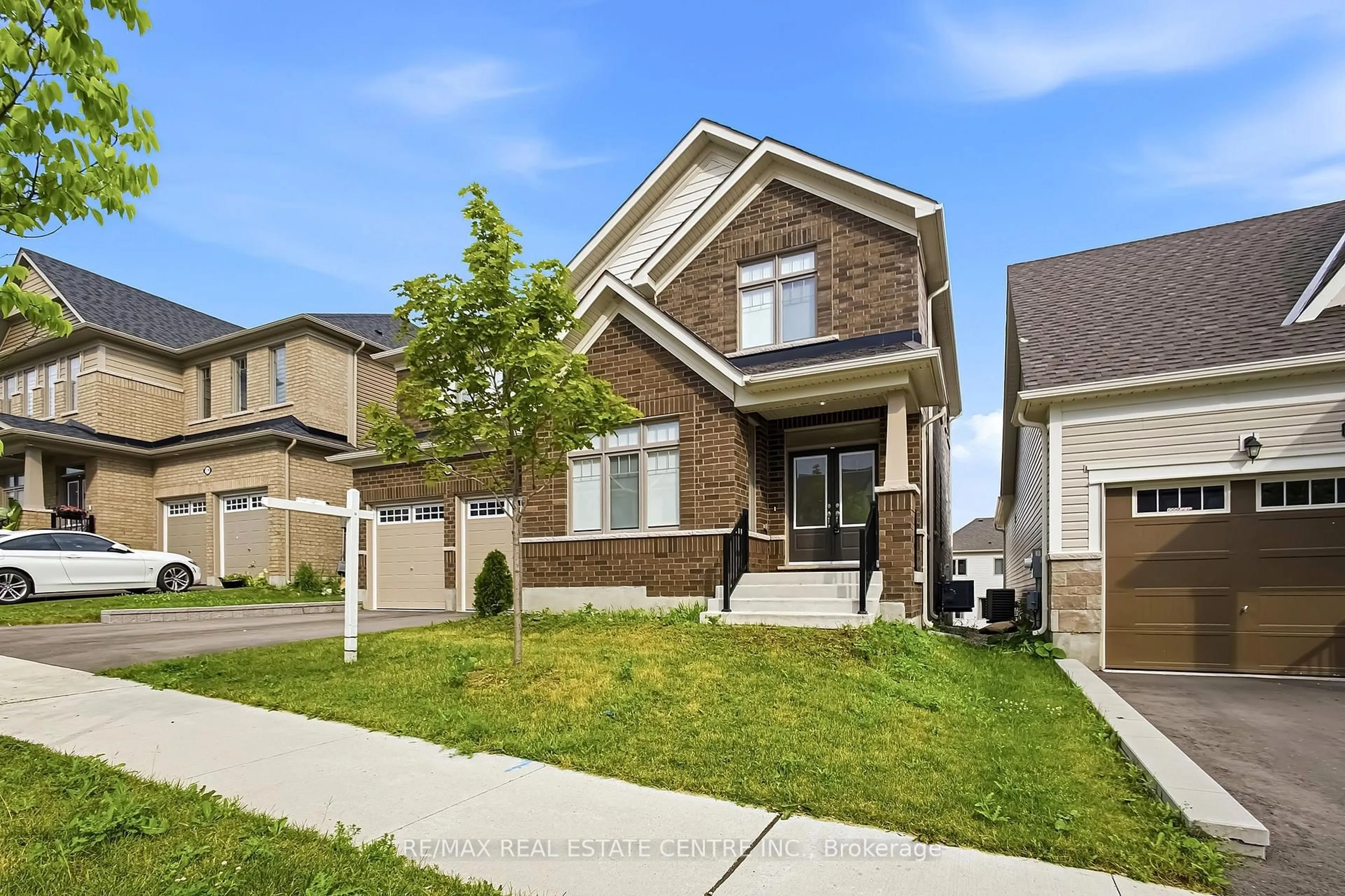 Home with brick exterior material, street for 123 REA Dr, Centre Wellington Ontario N1M 0J8