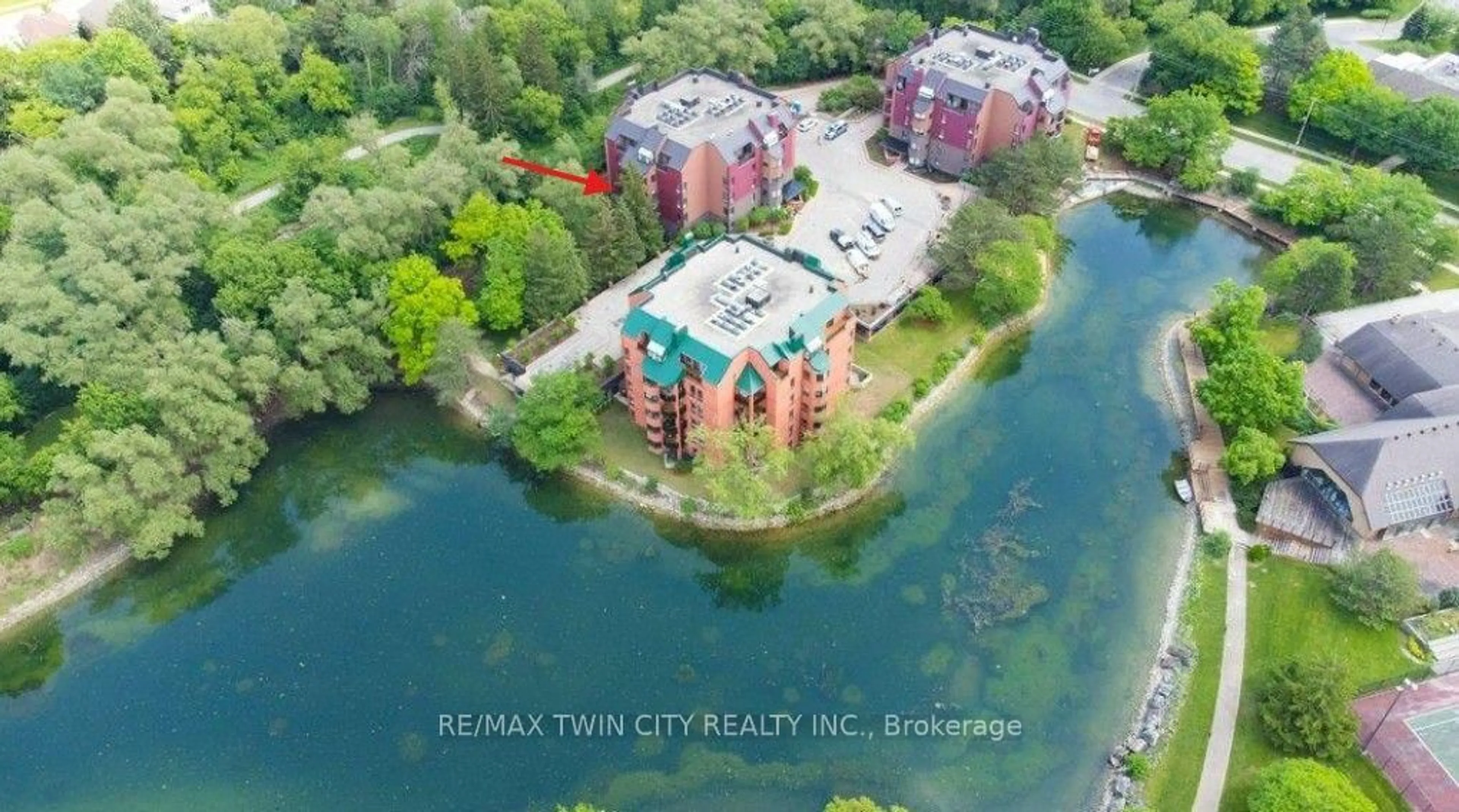 A pic from outside/outdoor area/front of a property/back of a property/a pic from drone, water/lake/river/ocean view for 52 Blue Springs Dr #32, Waterloo Ontario N2J 4M4