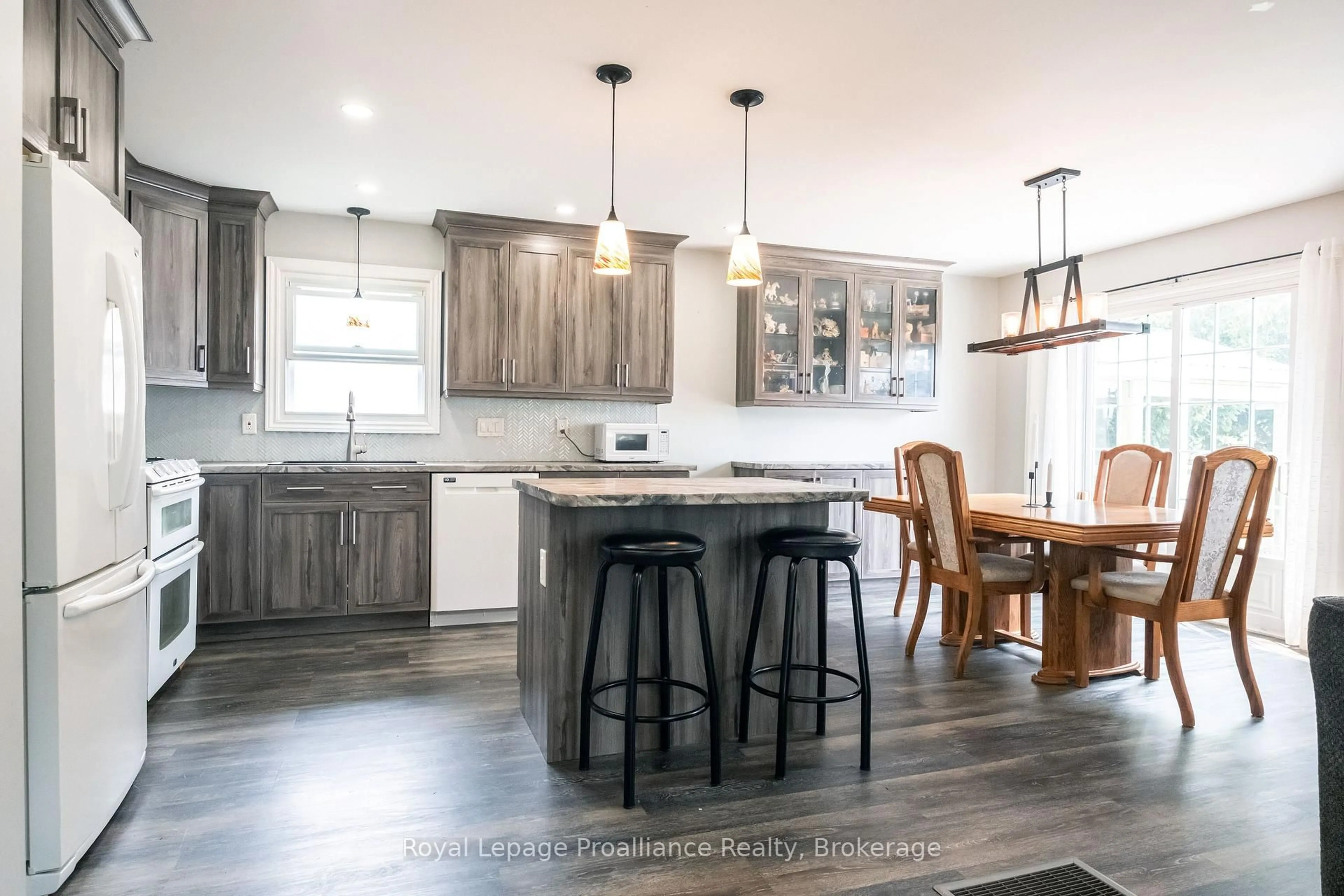 Open concept kitchen, wood/laminate floor for 115 Nicholas St, Quinte West Ontario K8V 6E8