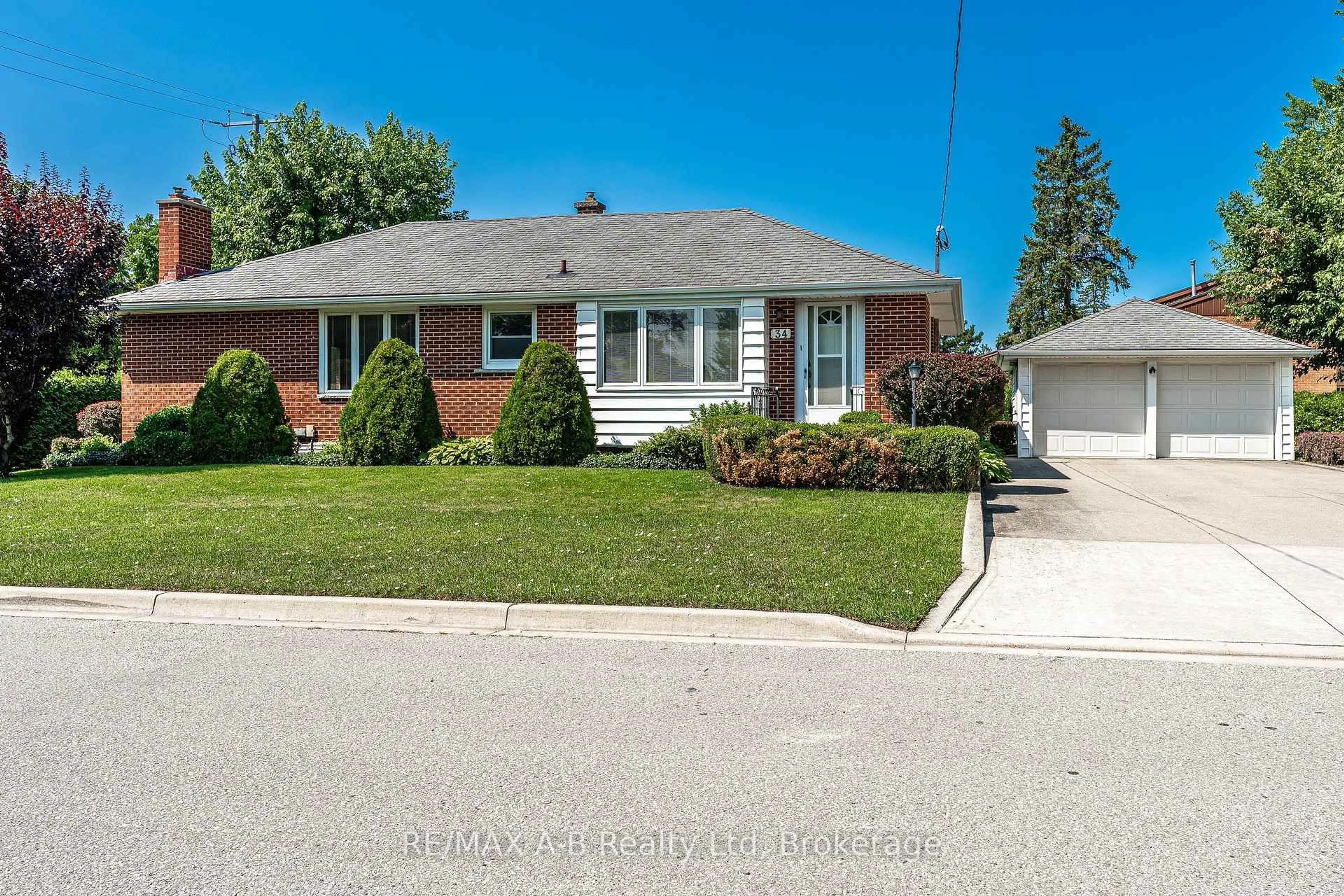 Home with brick exterior material, street for 34 Warner St, St. Marys Ontario N4X 0C3