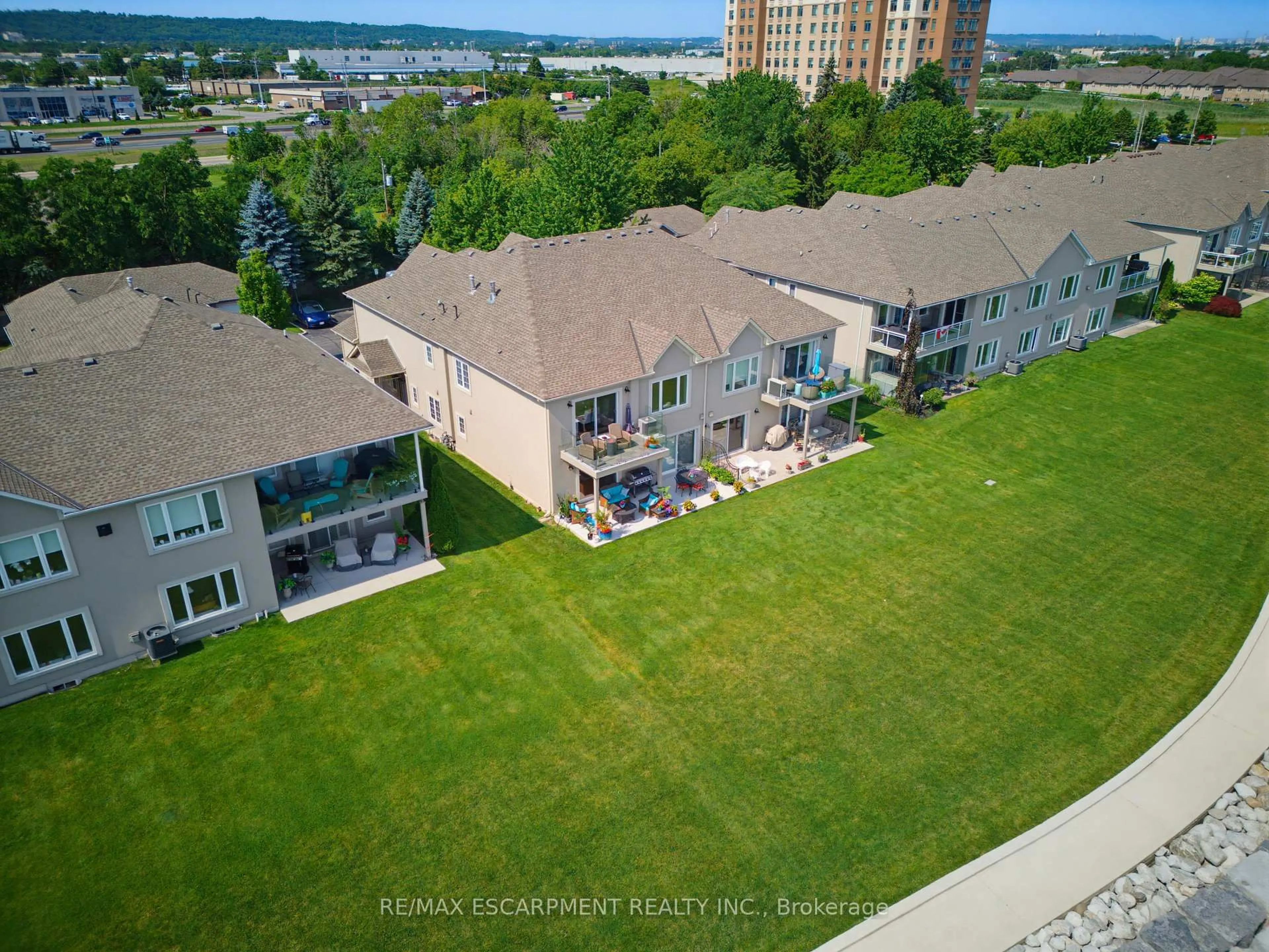 A pic from outside/outdoor area/front of a property/back of a property/a pic from drone, water/lake/river/ocean view for 484 Millen Rd #15, Hamilton Ontario L8E 6G4