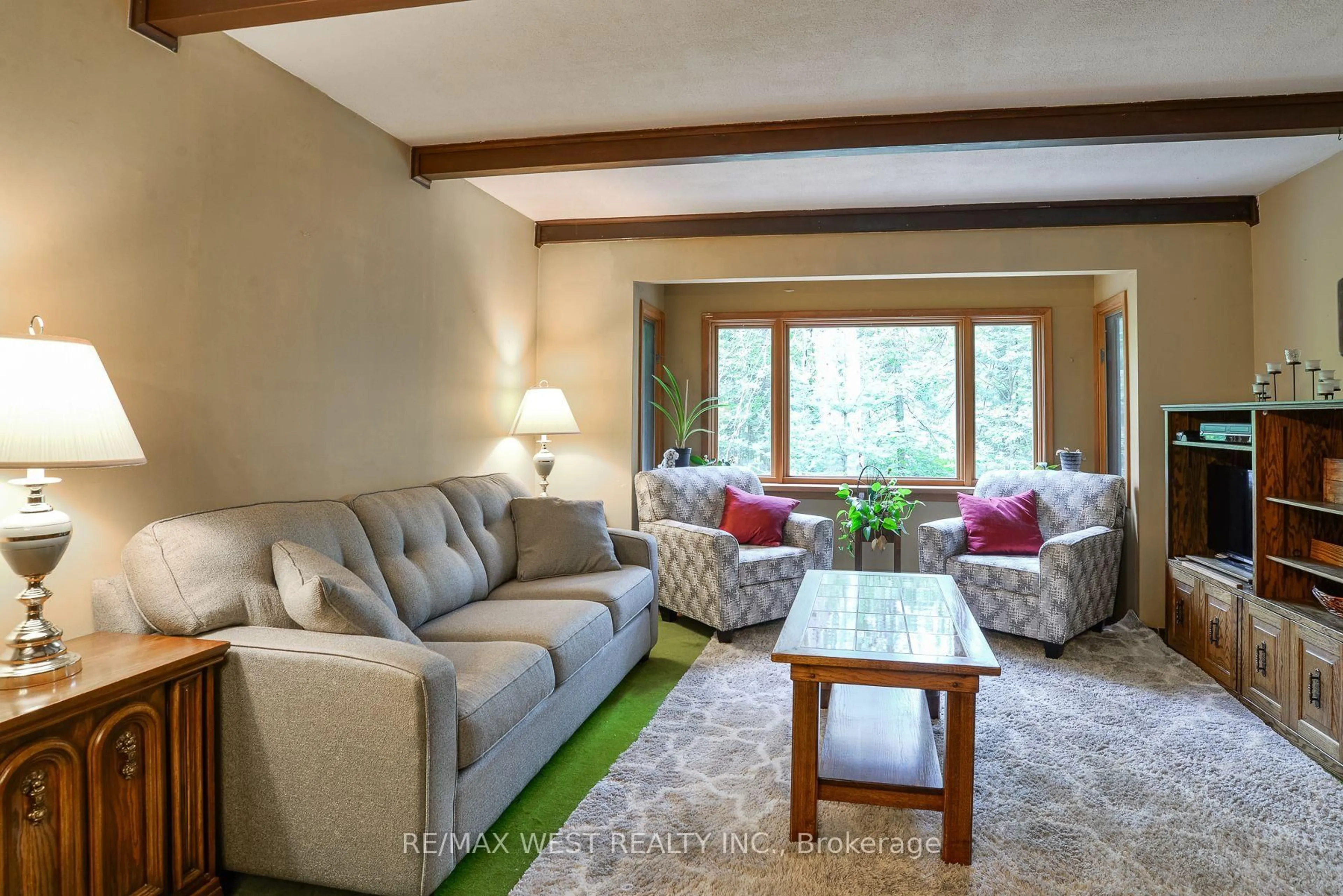 Living room with furniture, unknown for 52 Robert Rd, Huntsville Ontario P1H 2J4