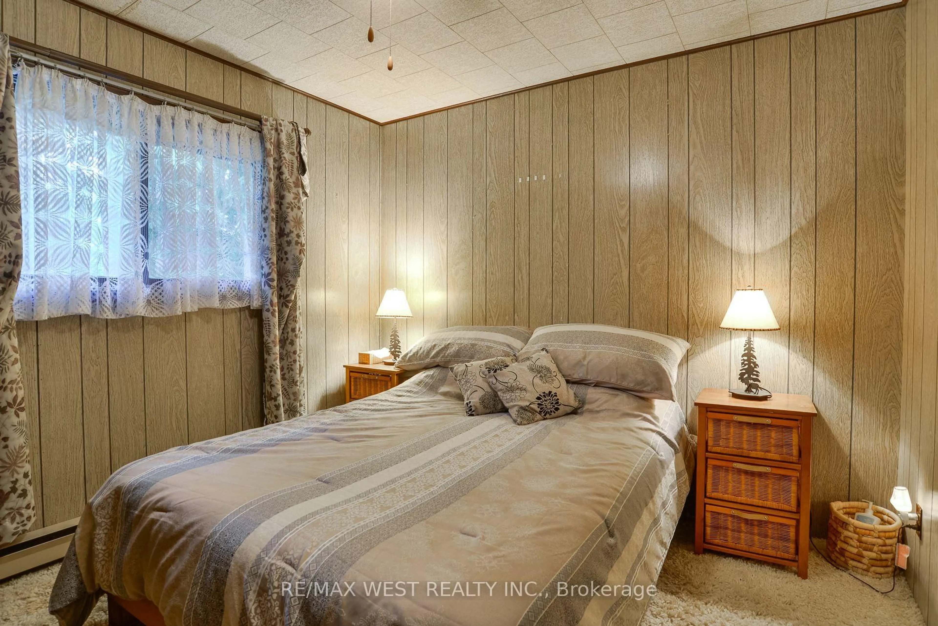 Bedroom with bed, unknown for 52 Robert Rd, Huntsville Ontario P1H 2J4
