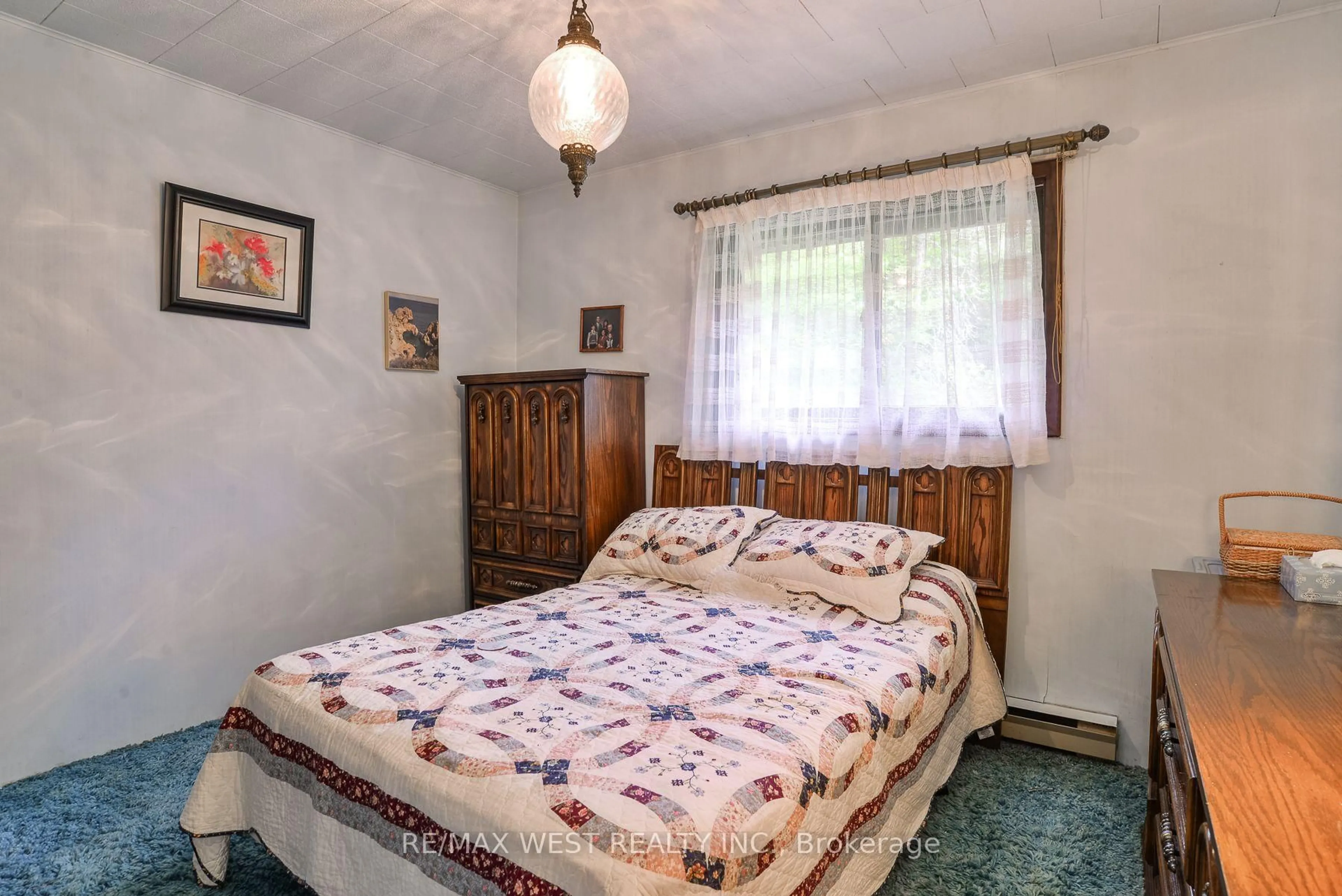 Bedroom with bed, unknown for 52 Robert Rd, Huntsville Ontario P1H 2J4