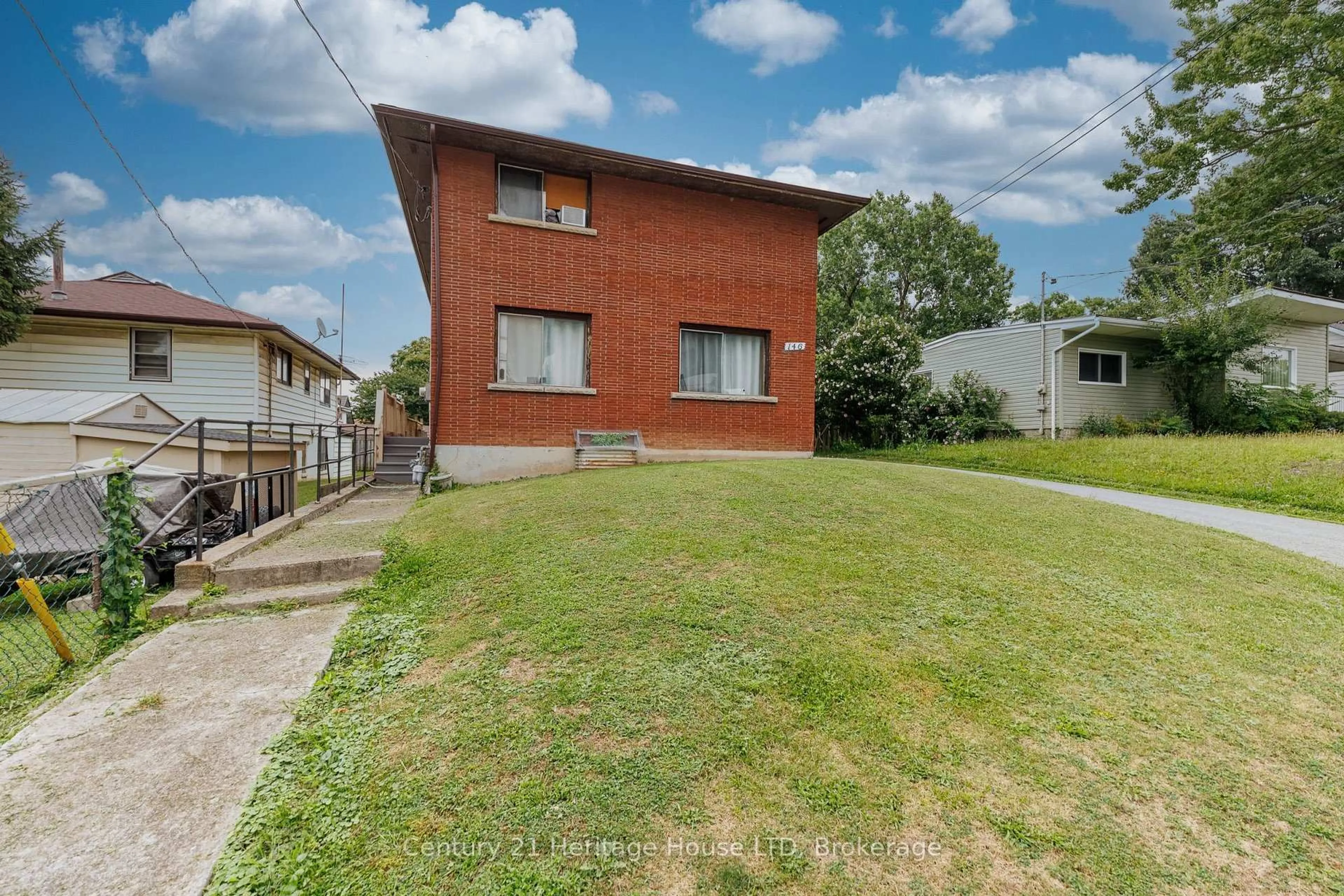 A pic from outside/outdoor area/front of a property/back of a property/a pic from drone, street for 146 Central Ave, Fort Erie Ontario L2A 3S7