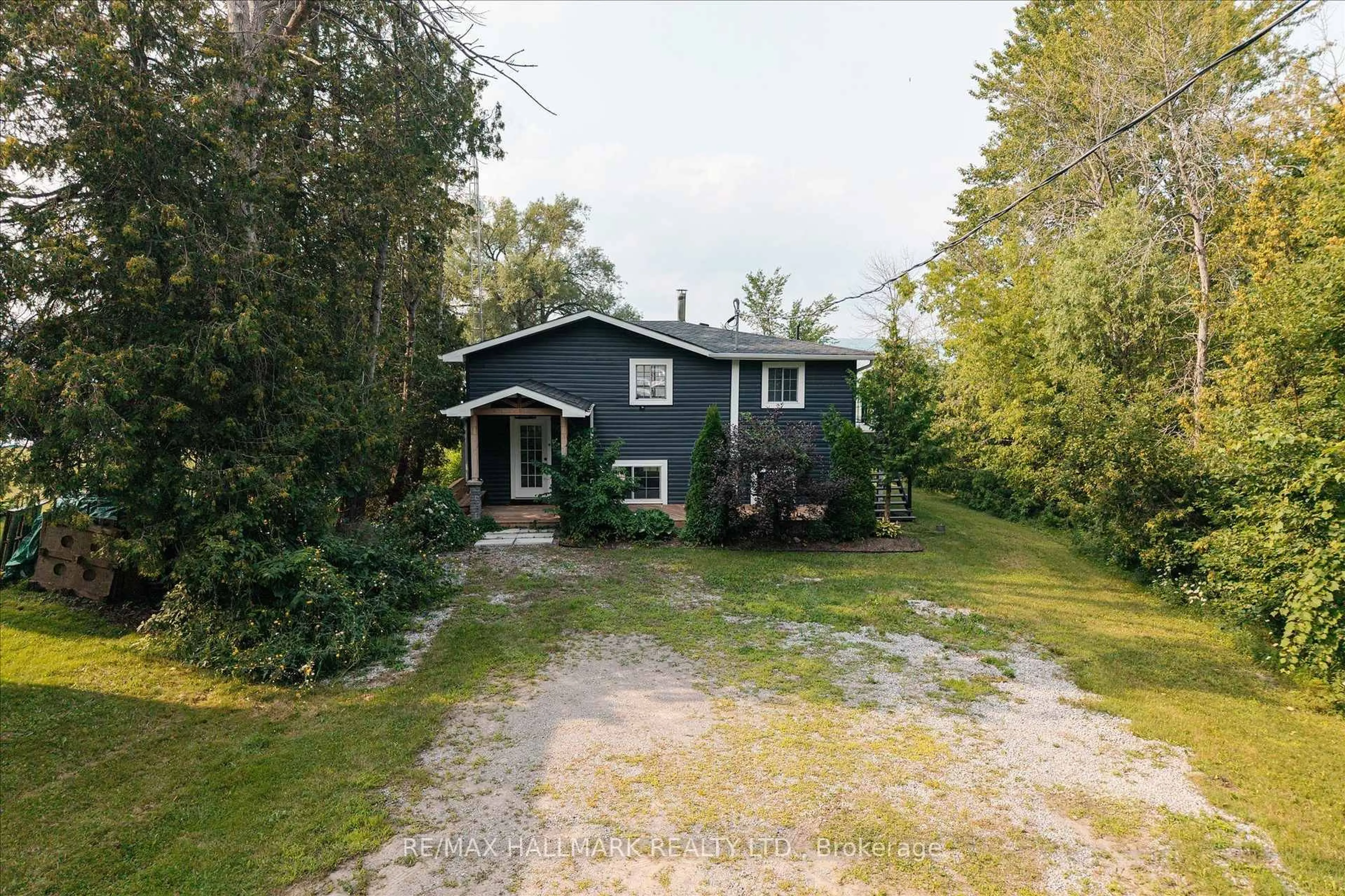 A pic from outside/outdoor area/front of a property/back of a property/a pic from drone, street for 5496 Rice Lake Scenic Dr #130, Hamilton Township Ontario K0K 2E0