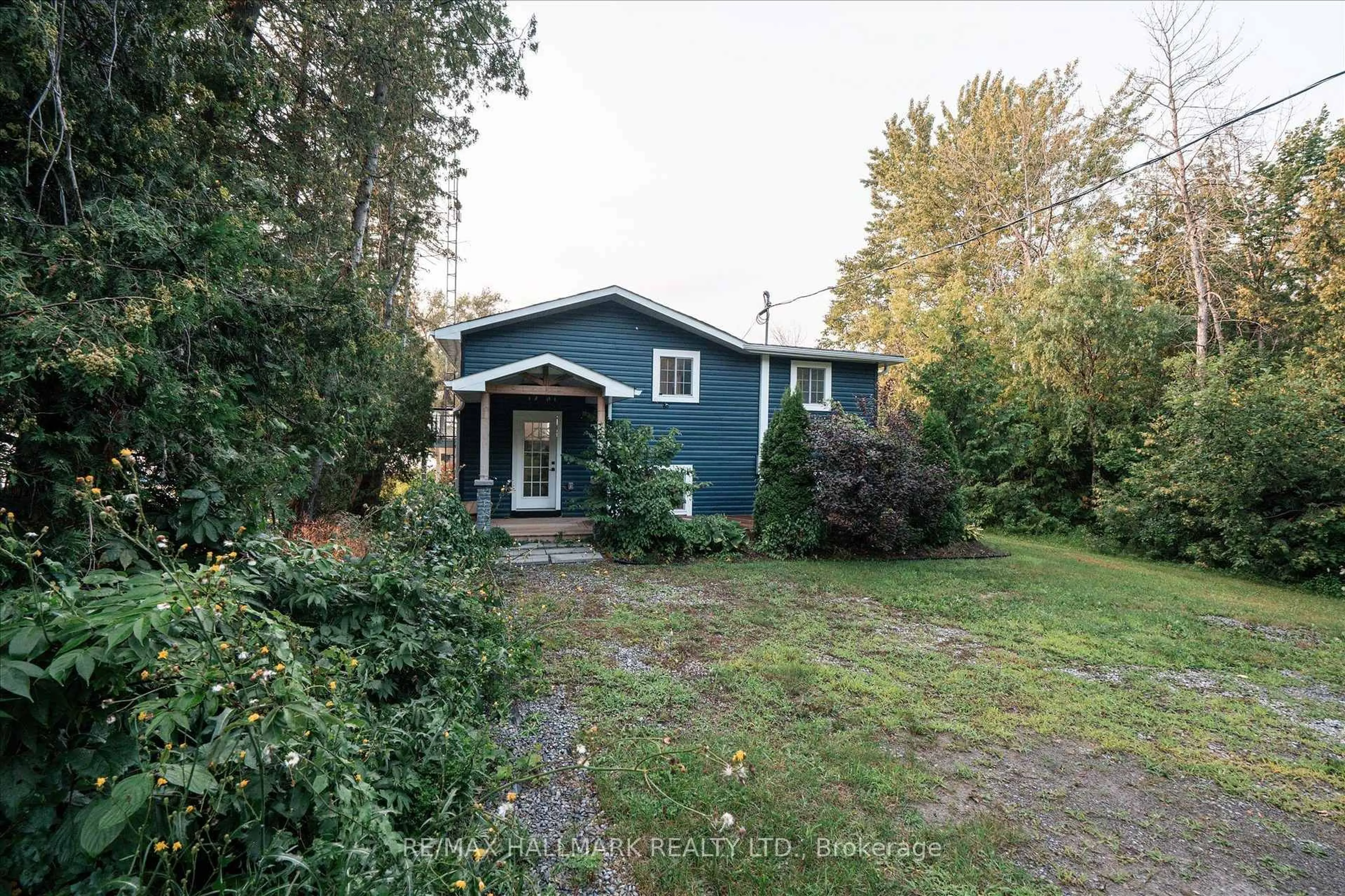 A pic from outside/outdoor area/front of a property/back of a property/a pic from drone, street for 5496 Rice Lake Scenic Dr #130, Hamilton Township Ontario K0K 2E0
